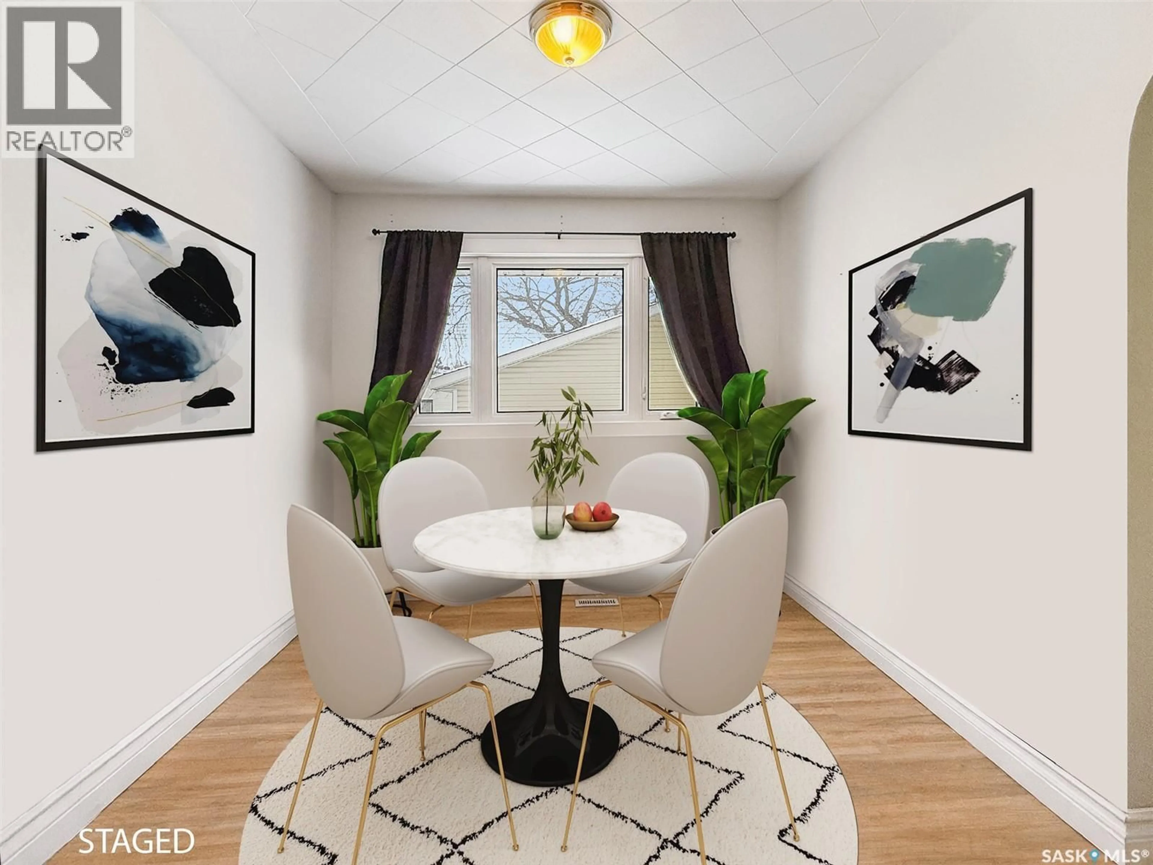 Dining room, wood/laminate floor for 271 14TH AVENUE, Swift Current Saskatchewan S9H2W8