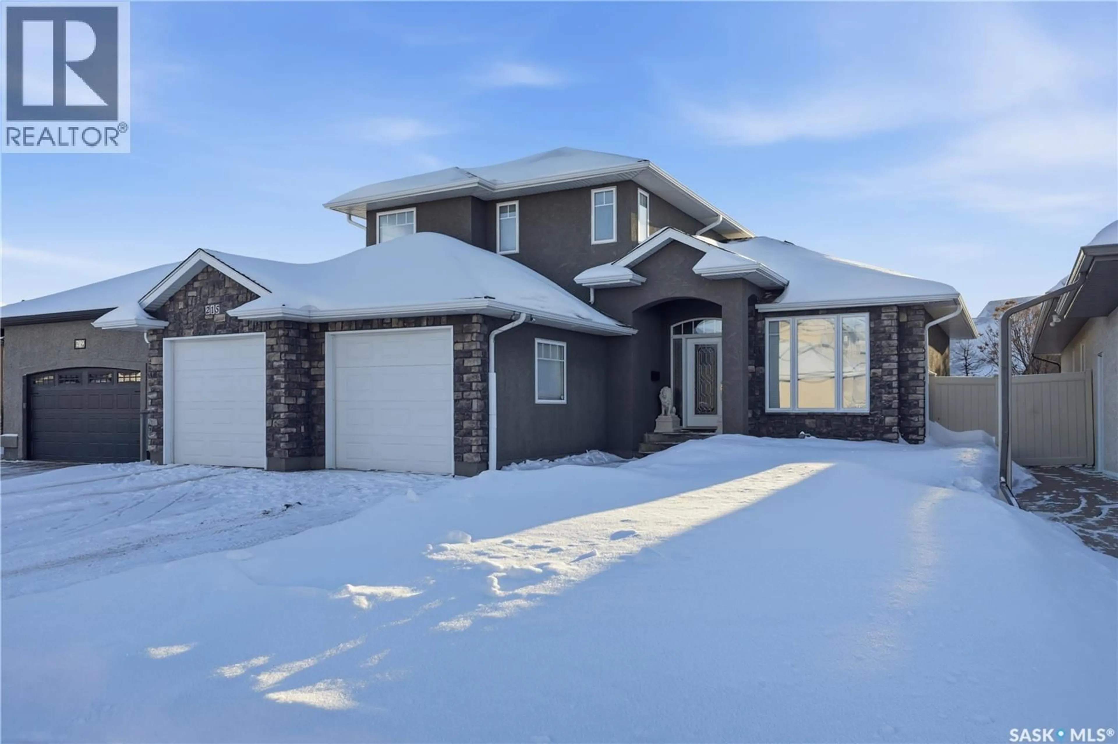 Home with brick exterior material, street for 215 BEECHWOOD CRESCENT, Saskatoon Saskatchewan S7V1K6