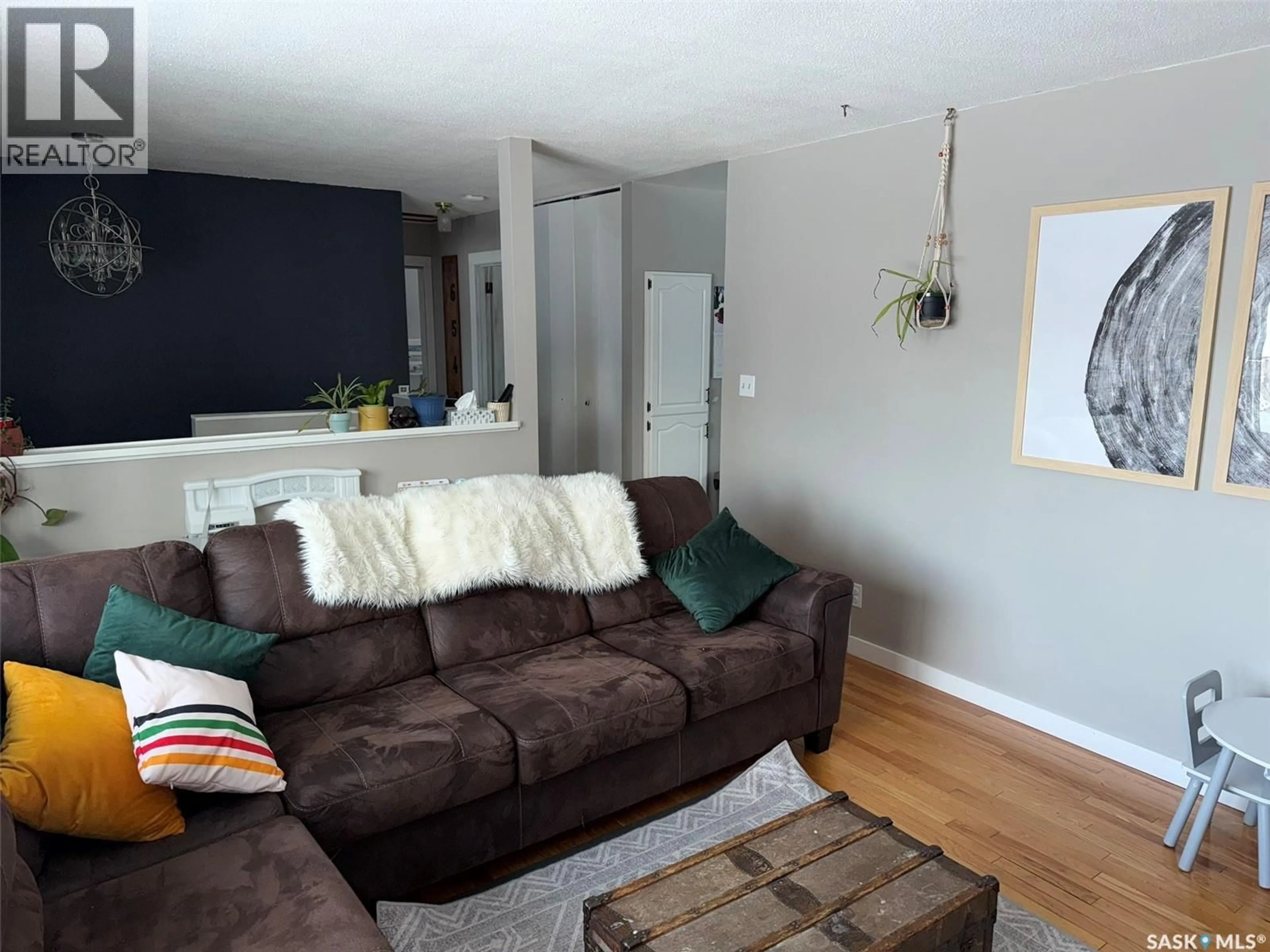 Living room with furniture, unknown for 410 MILLER CRESCENT, Wynyard Saskatchewan S0A4T0