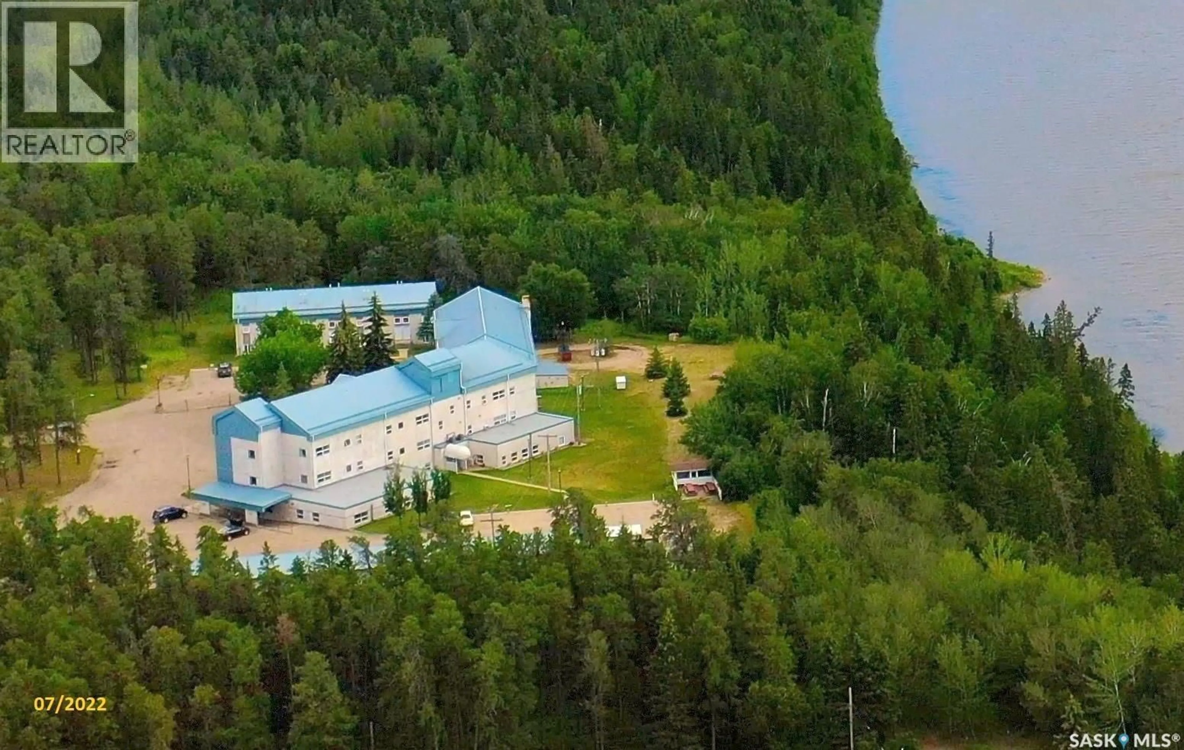 A pic from outside/outdoor area/front of a property/back of a property/a pic from drone, mountain view for 112 102 MANOR DRIVE, Nipawin Saskatchewan S0E1E0