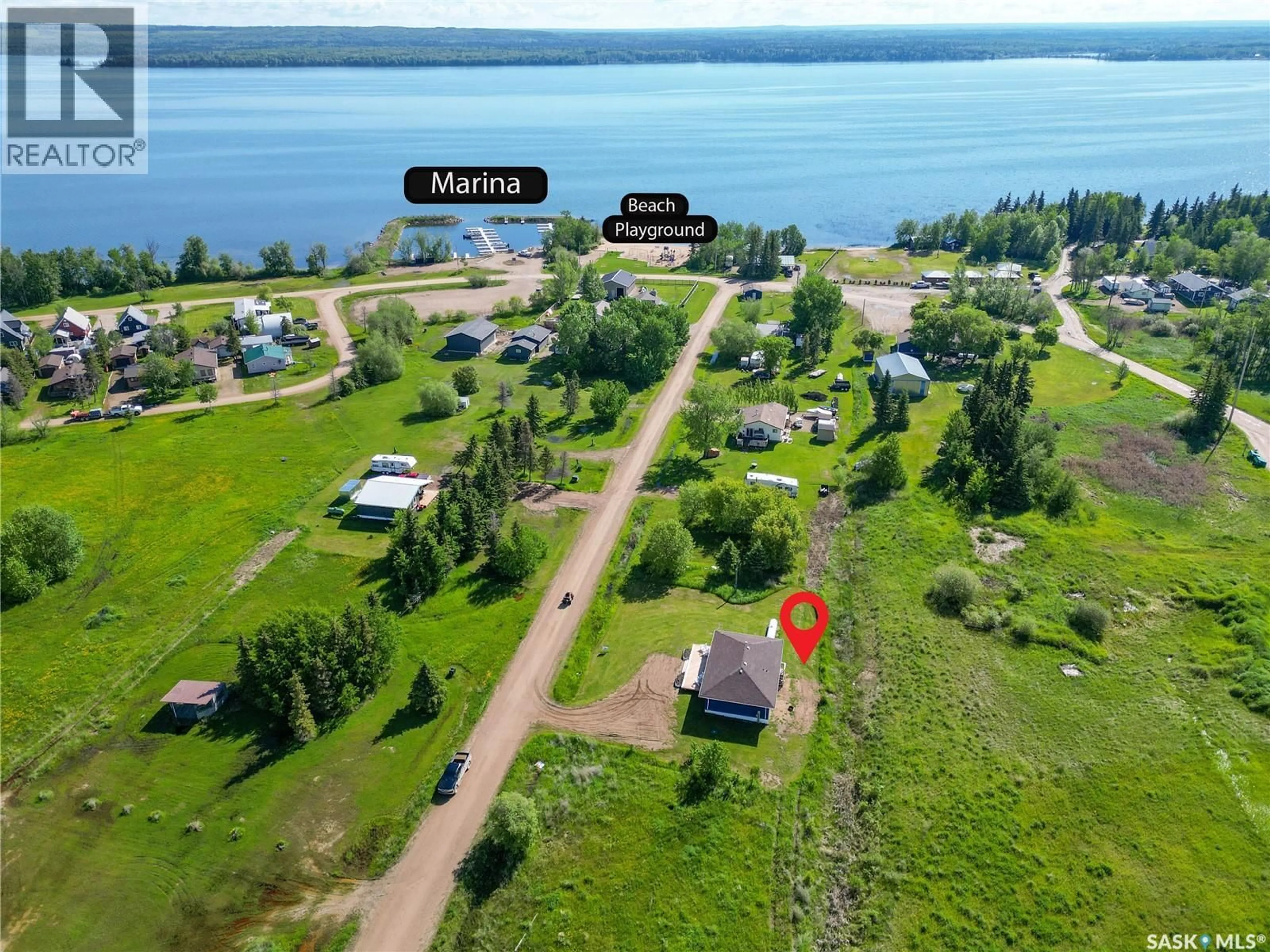 A pic from outside/outdoor area/front of a property/back of a property/a pic from drone, water/lake/river/ocean view for 5 IVORY DRIVE, Big River Rm No. 555 Saskatchewan S0J0E0