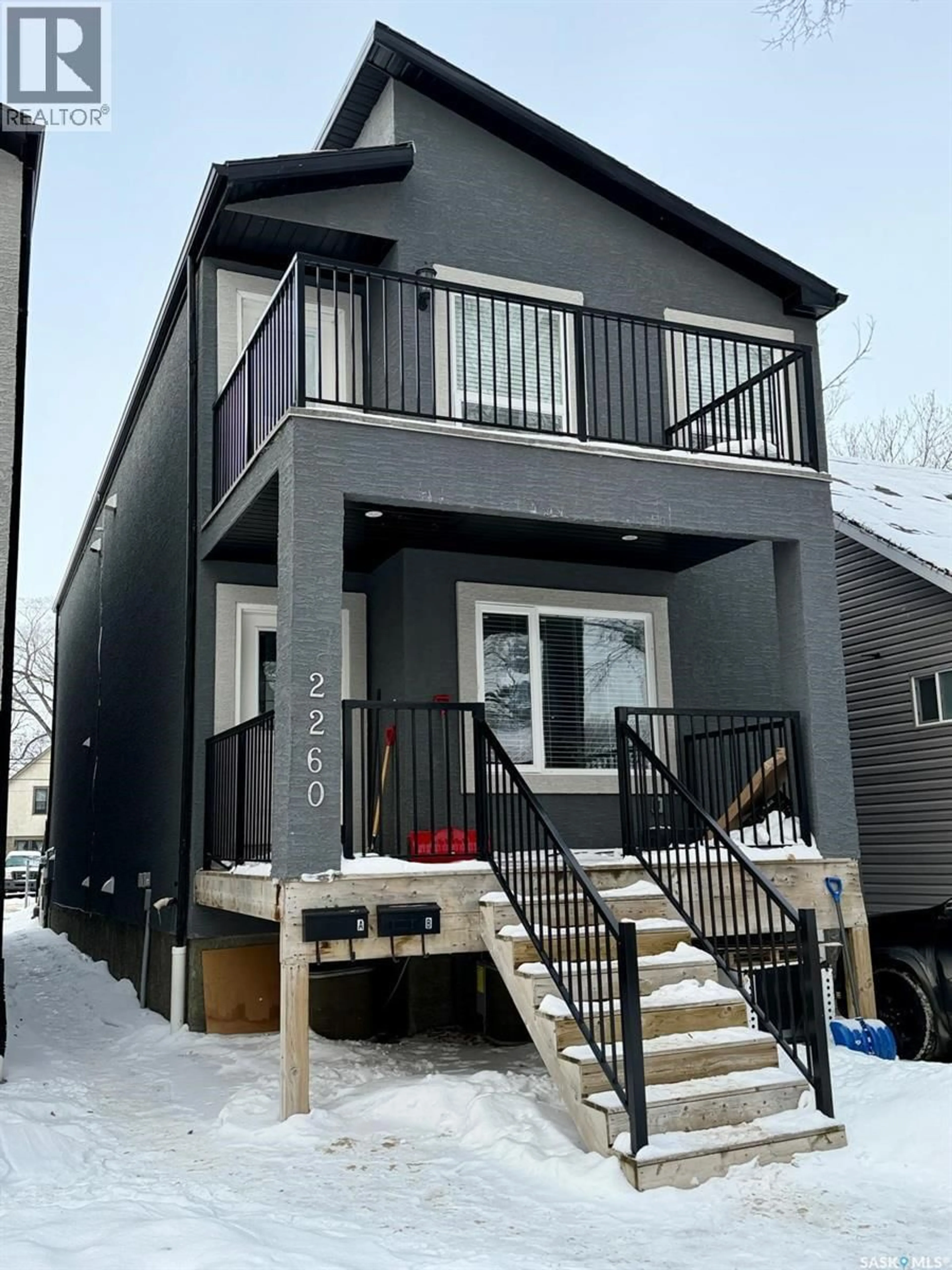 Home with vinyl exterior material, street for 2260 MONTREAL STREET, Regina Saskatchewan S4P1L6