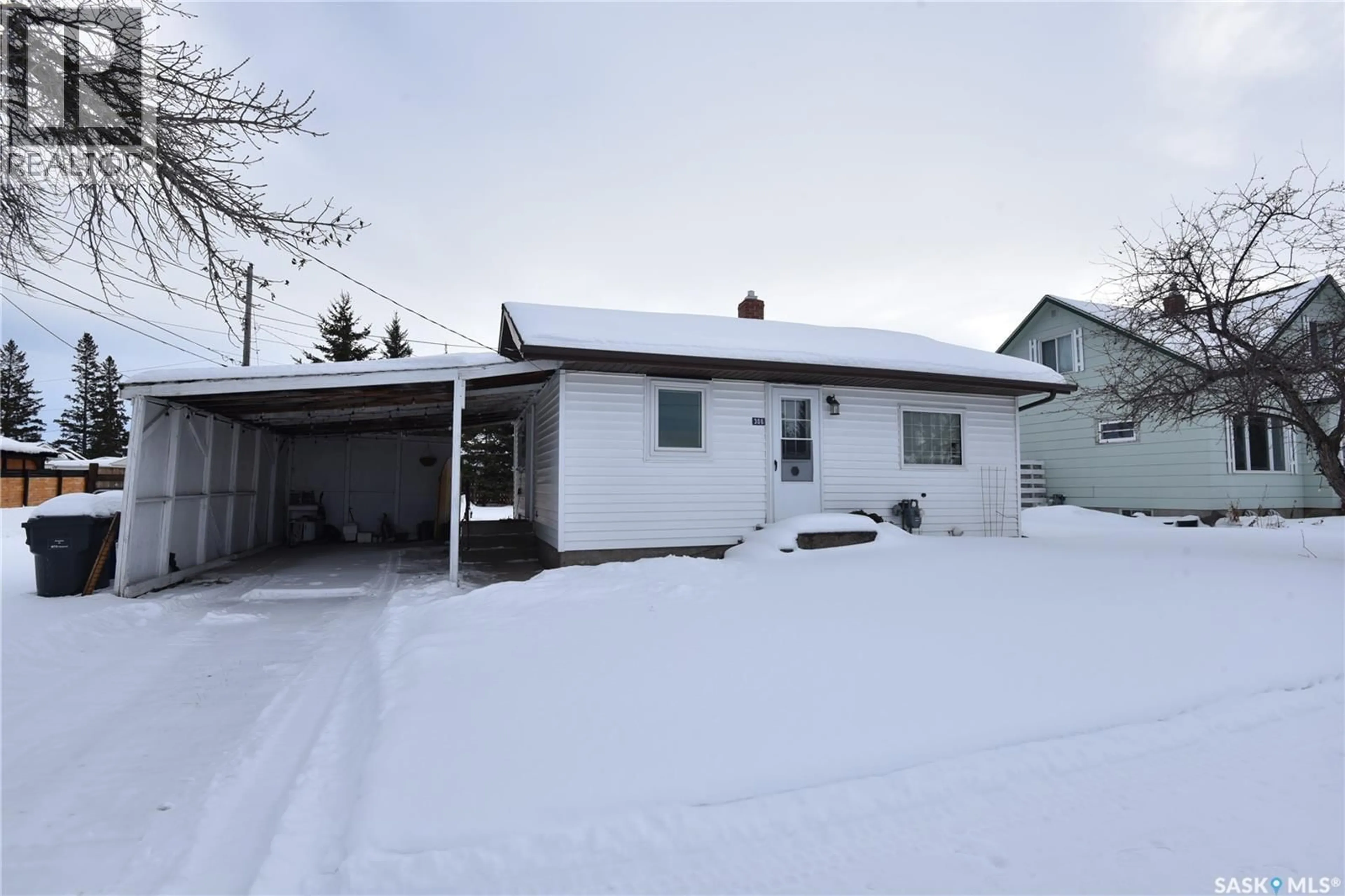 A pic from outside/outdoor area/front of a property/back of a property/a pic from drone, street for 306 3RD AVENUE, Nipawin Saskatchewan S0E1E0