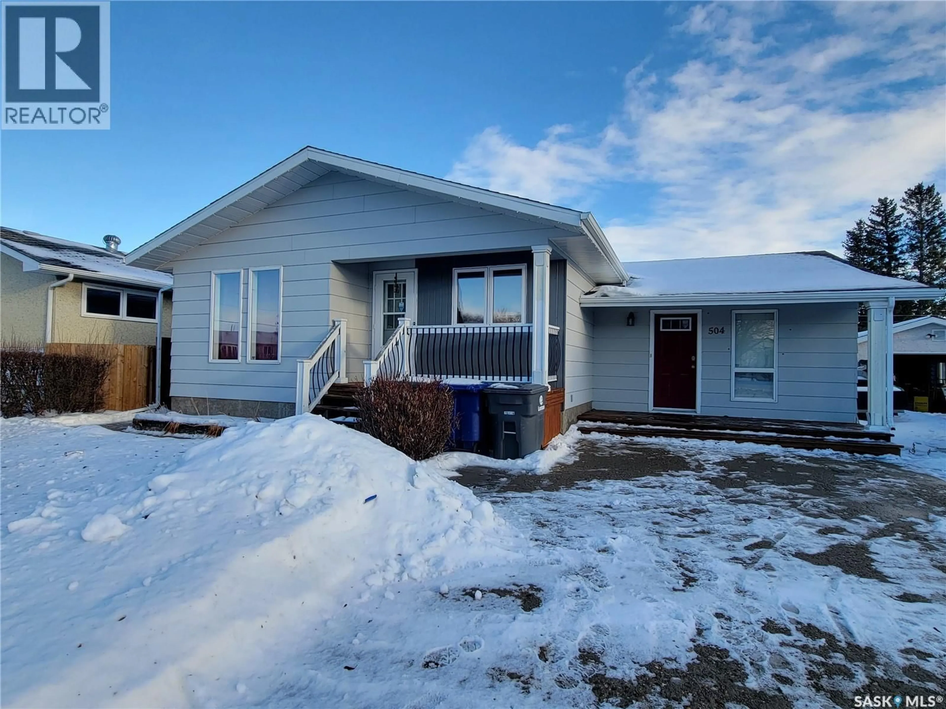 Home with vinyl exterior material, street for 504 2ND STREET, Wilkie Saskatchewan S0K4W0