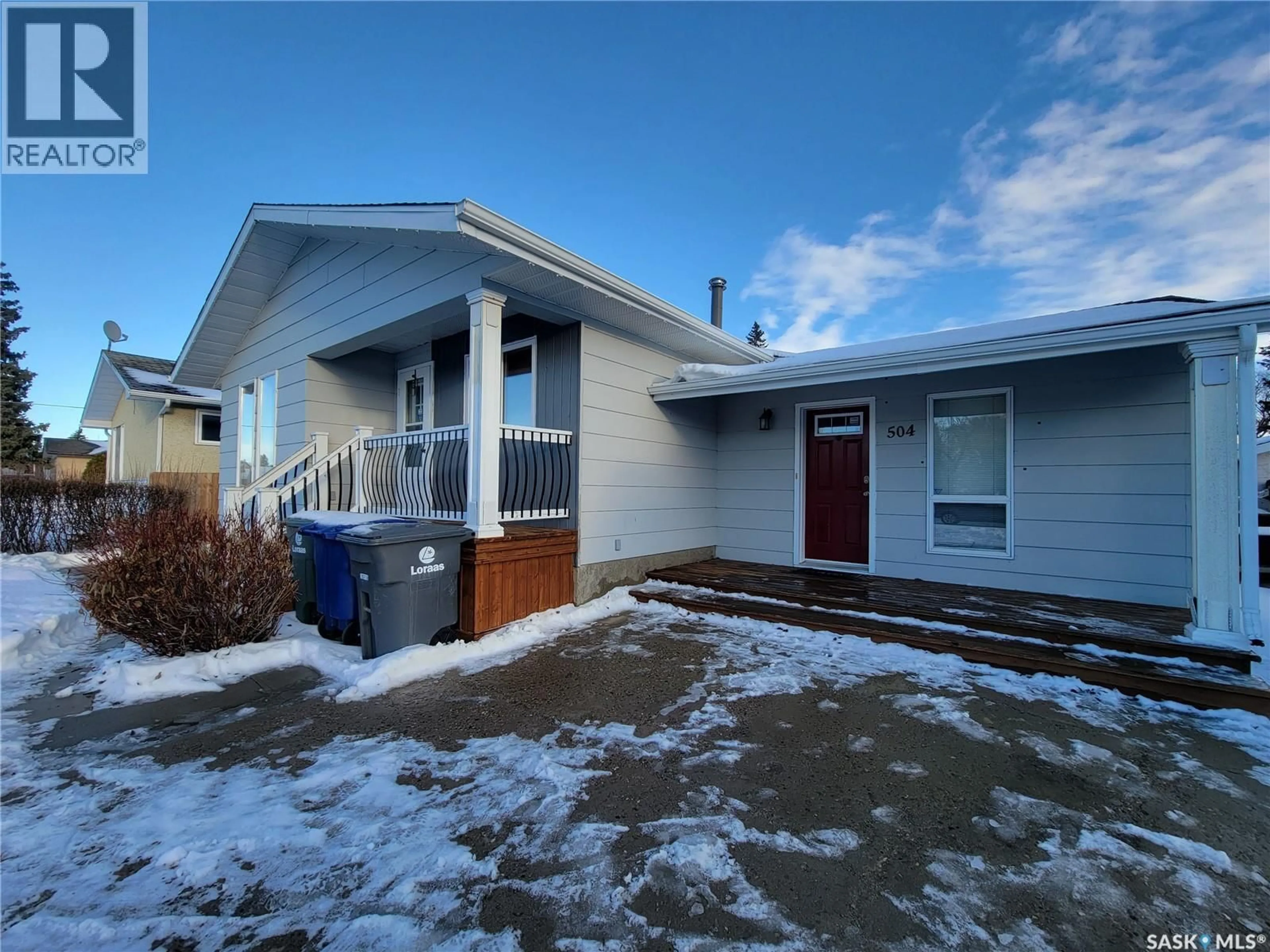 Home with vinyl exterior material, street for 504 2ND STREET, Wilkie Saskatchewan S0K4W0