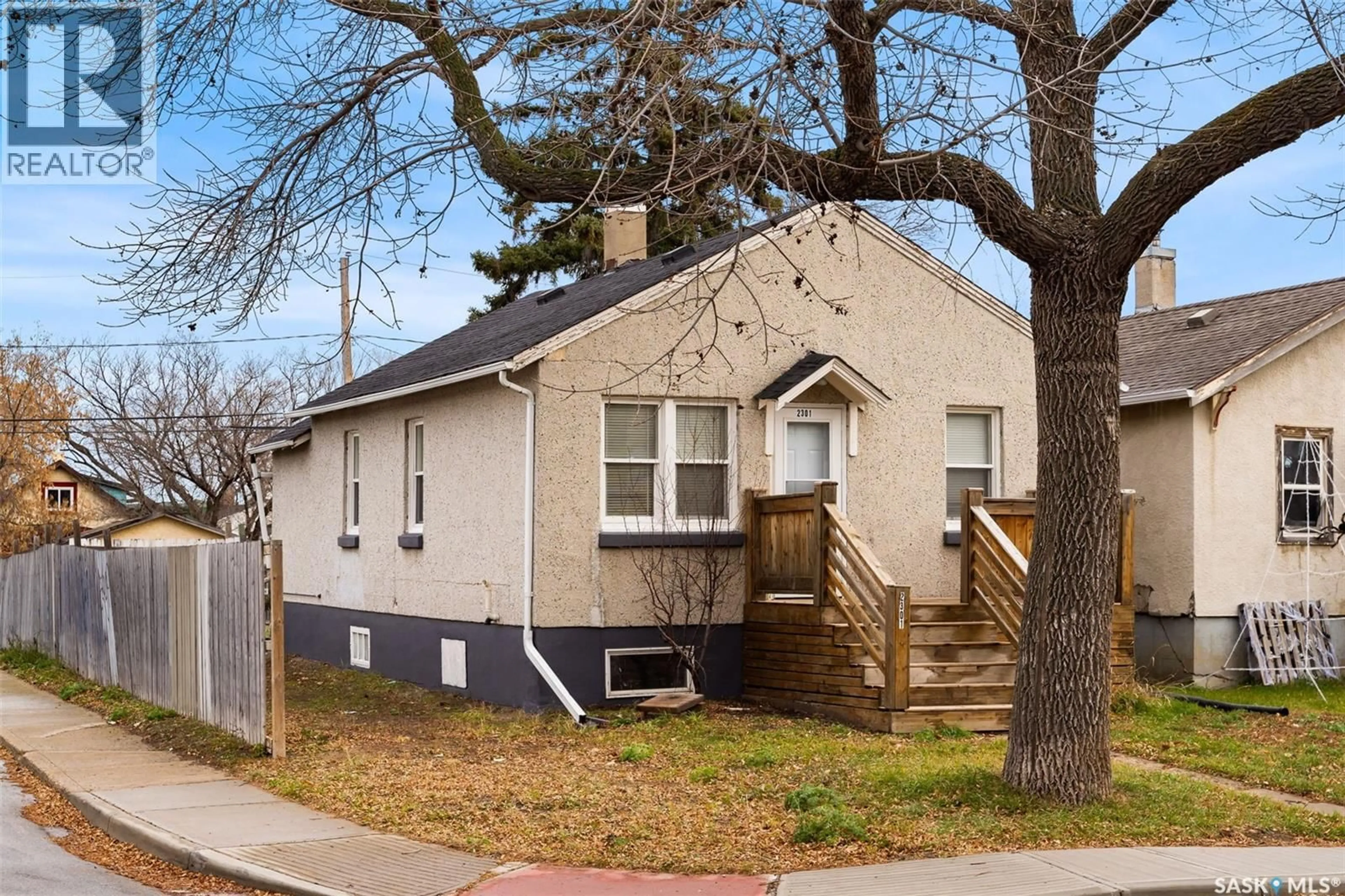 Home with vinyl exterior material, street for 2301 REYNOLDS STREET, Regina Saskatchewan S4N3N6