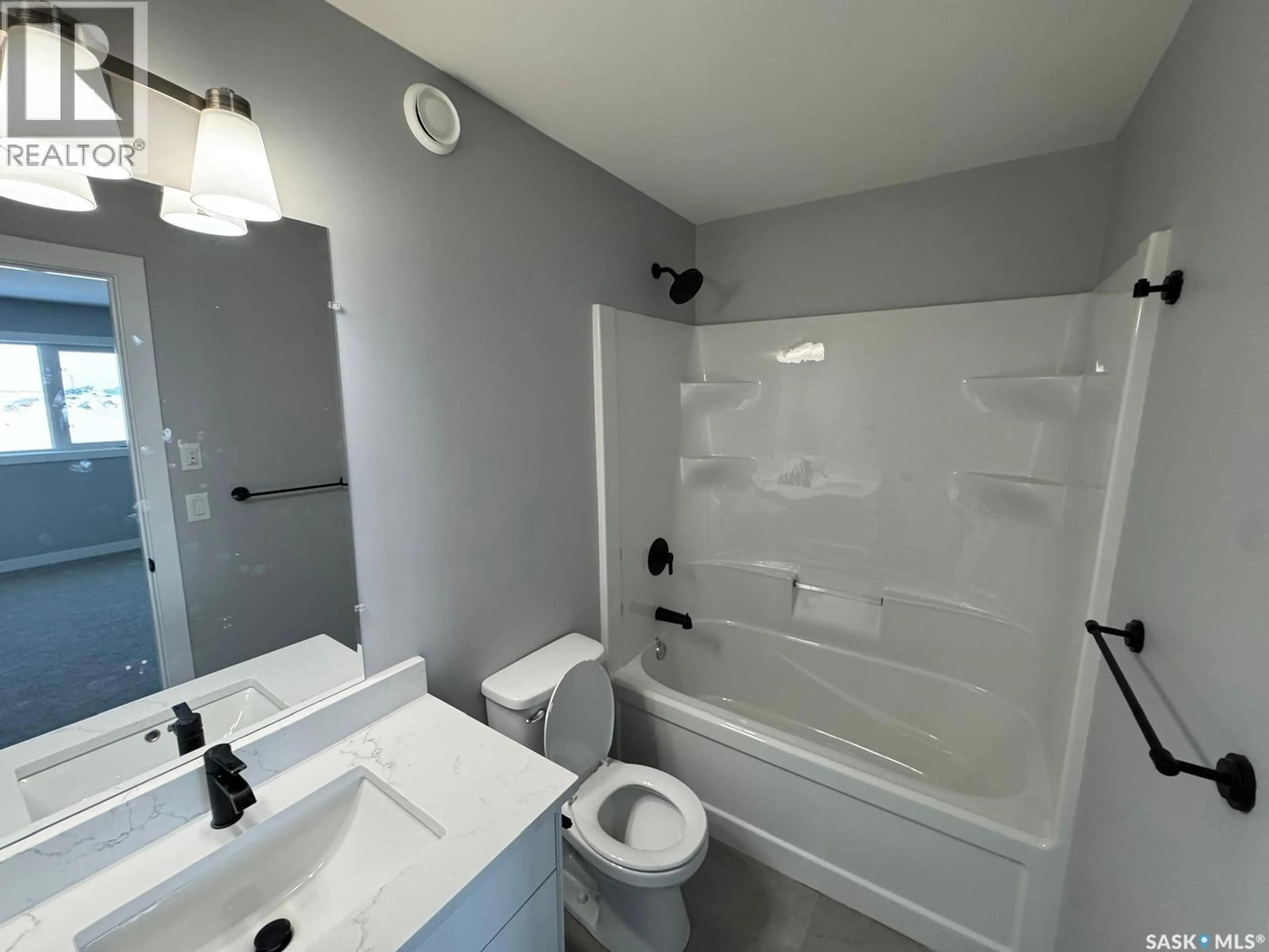 Standard bathroom, ceramic/tile floor for 419 STROMBERG CRESCENT, Saskatoon Saskatchewan S7L7P1