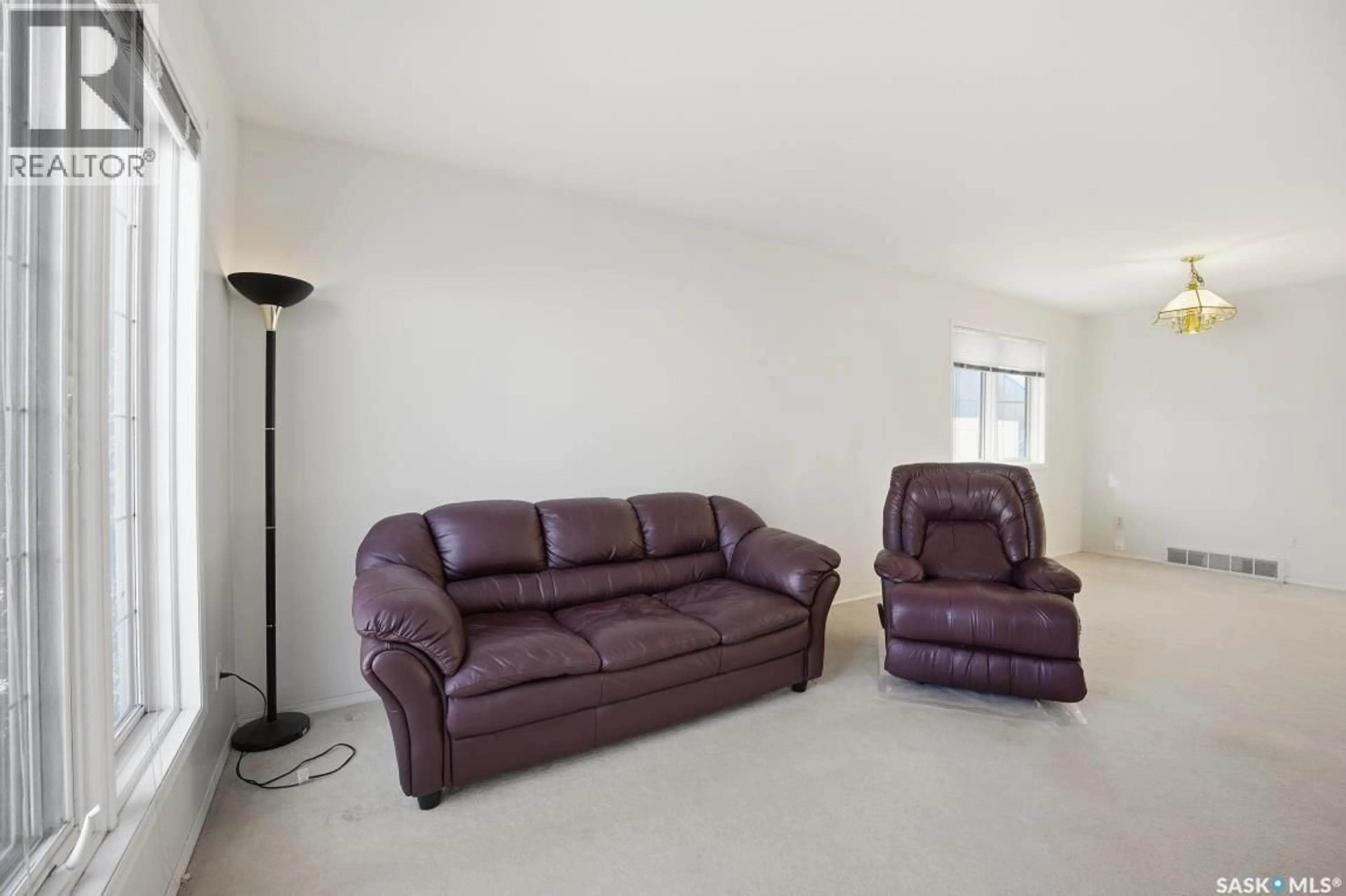 Living room with furniture, unknown for 306 BUDZ CRESCENT, Saskatoon Saskatchewan S7N4M5
