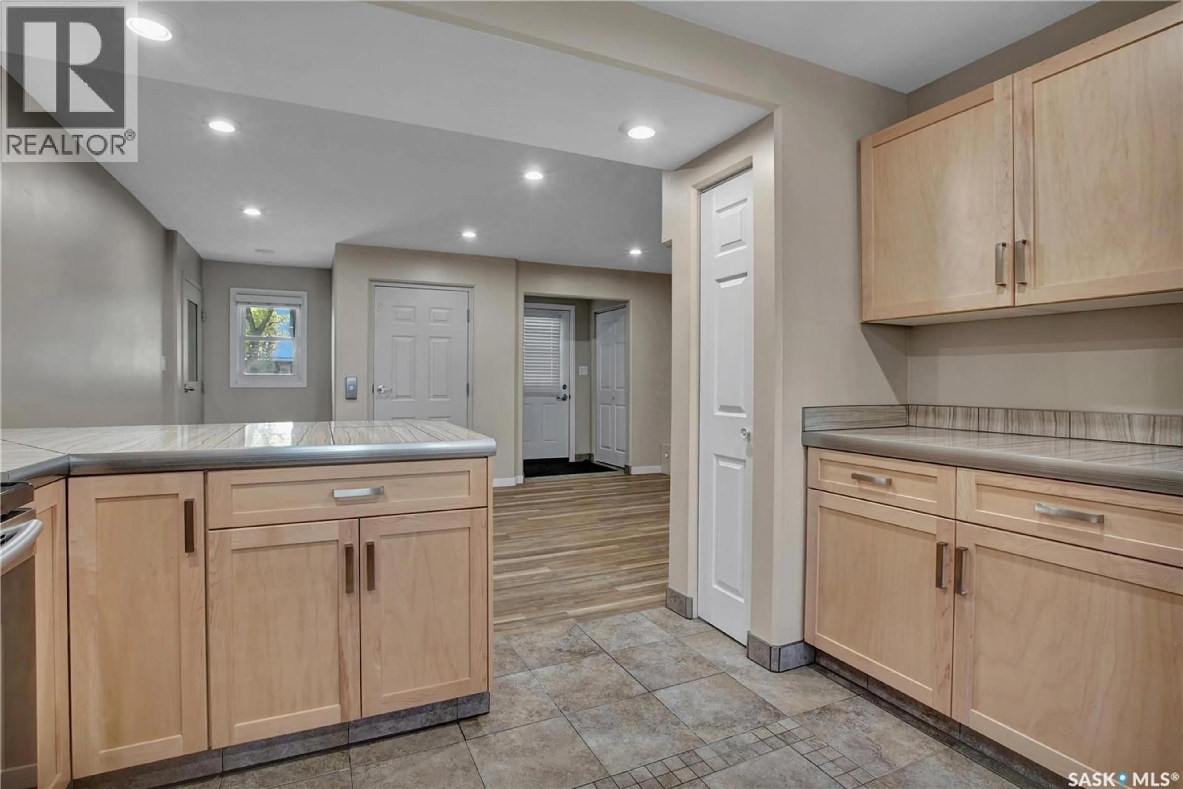 Open concept kitchen, ceramic/tile floor for 3102 CAEN STREET, Saskatoon Saskatchewan S7M3N5