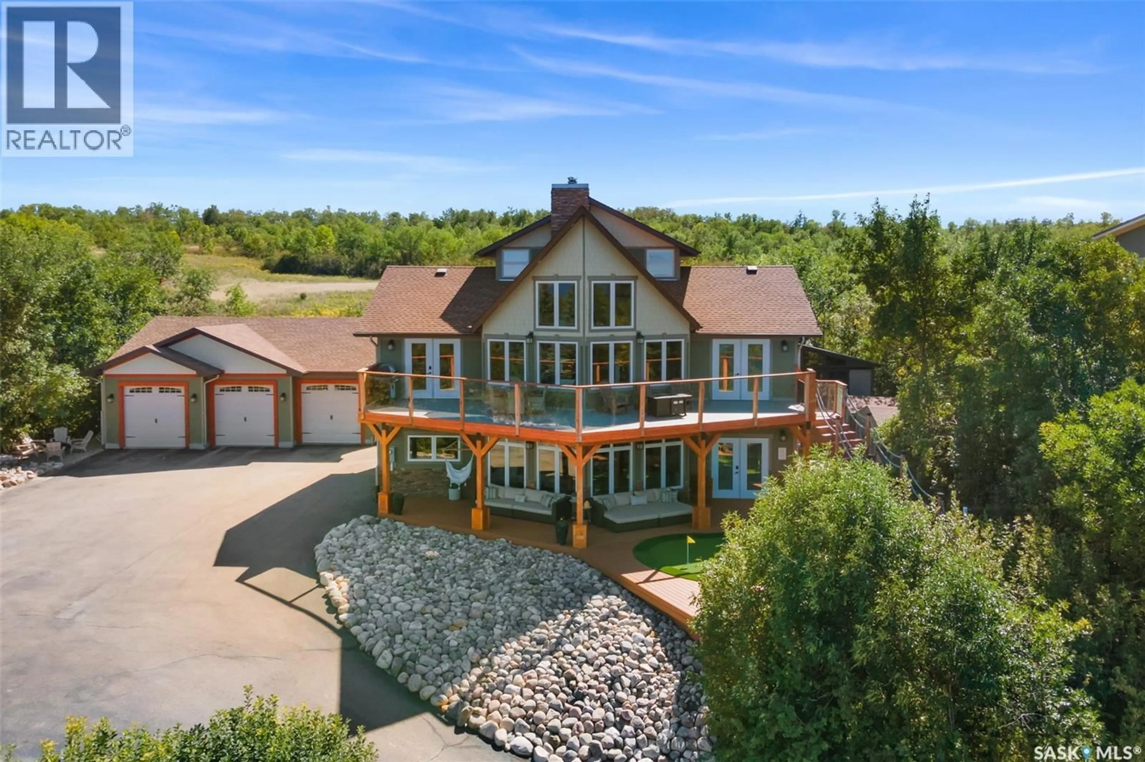 A pic from outside/outdoor area/front of a property/back of a property/a pic from drone, water/lake/river/ocean view for 537 SUNSET DRIVE, Last Mountain Lake IR 80a Saskatchewan S0G4C0
