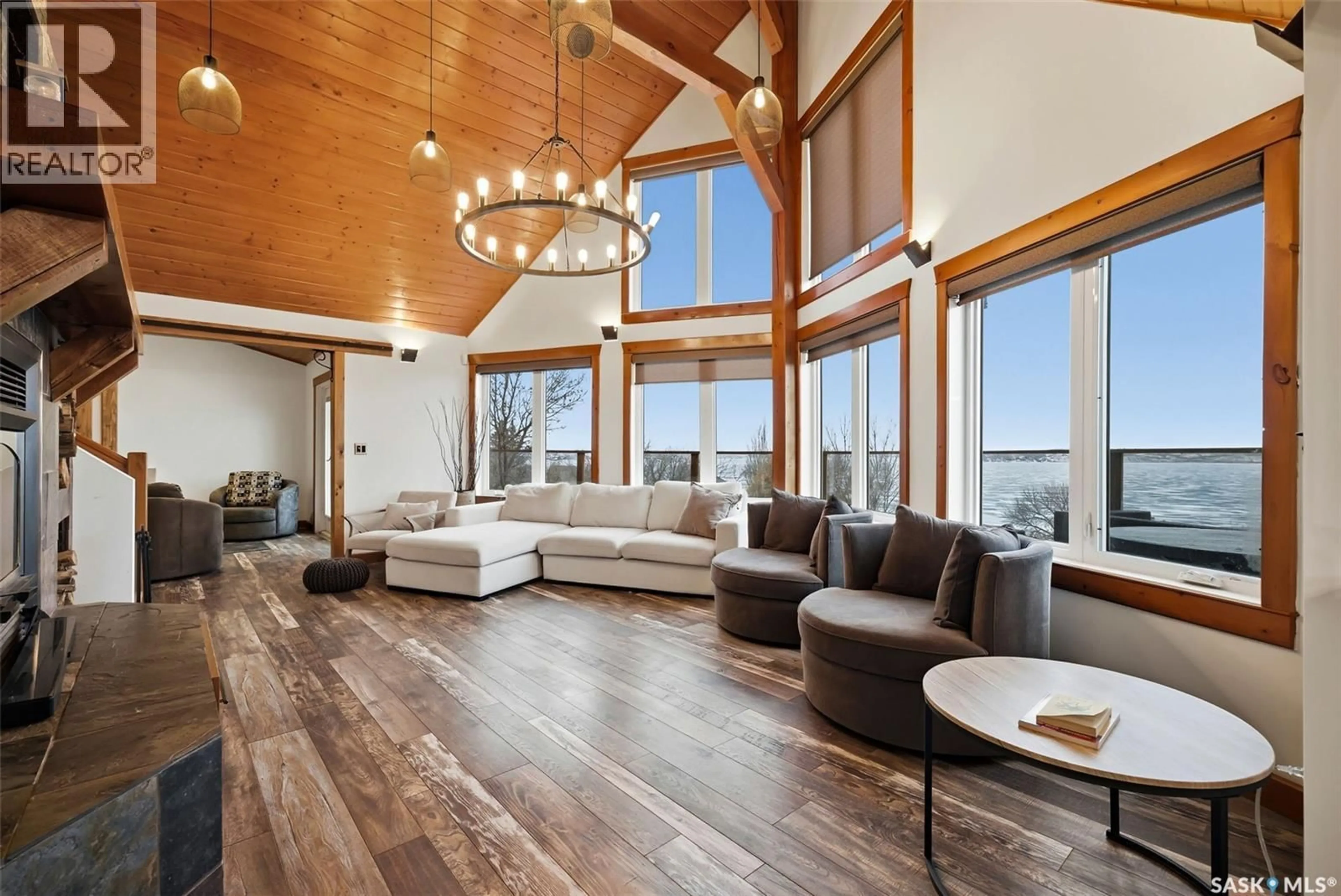 Living room with furniture, wood/laminate floor for 537 SUNSET DRIVE, Last Mountain Lake IR 80a Saskatchewan S0G4C0