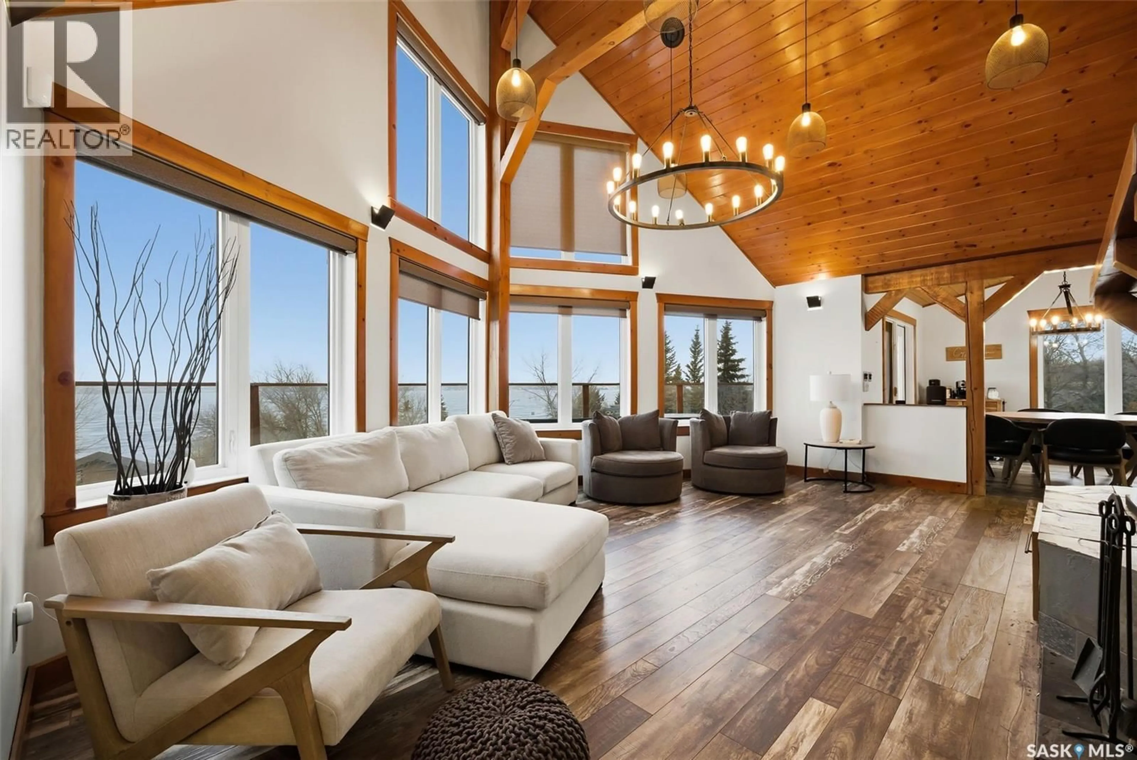 Living room with furniture, wood/laminate floor for 537 SUNSET DRIVE, Last Mountain Lake IR 80a Saskatchewan S0G4C0