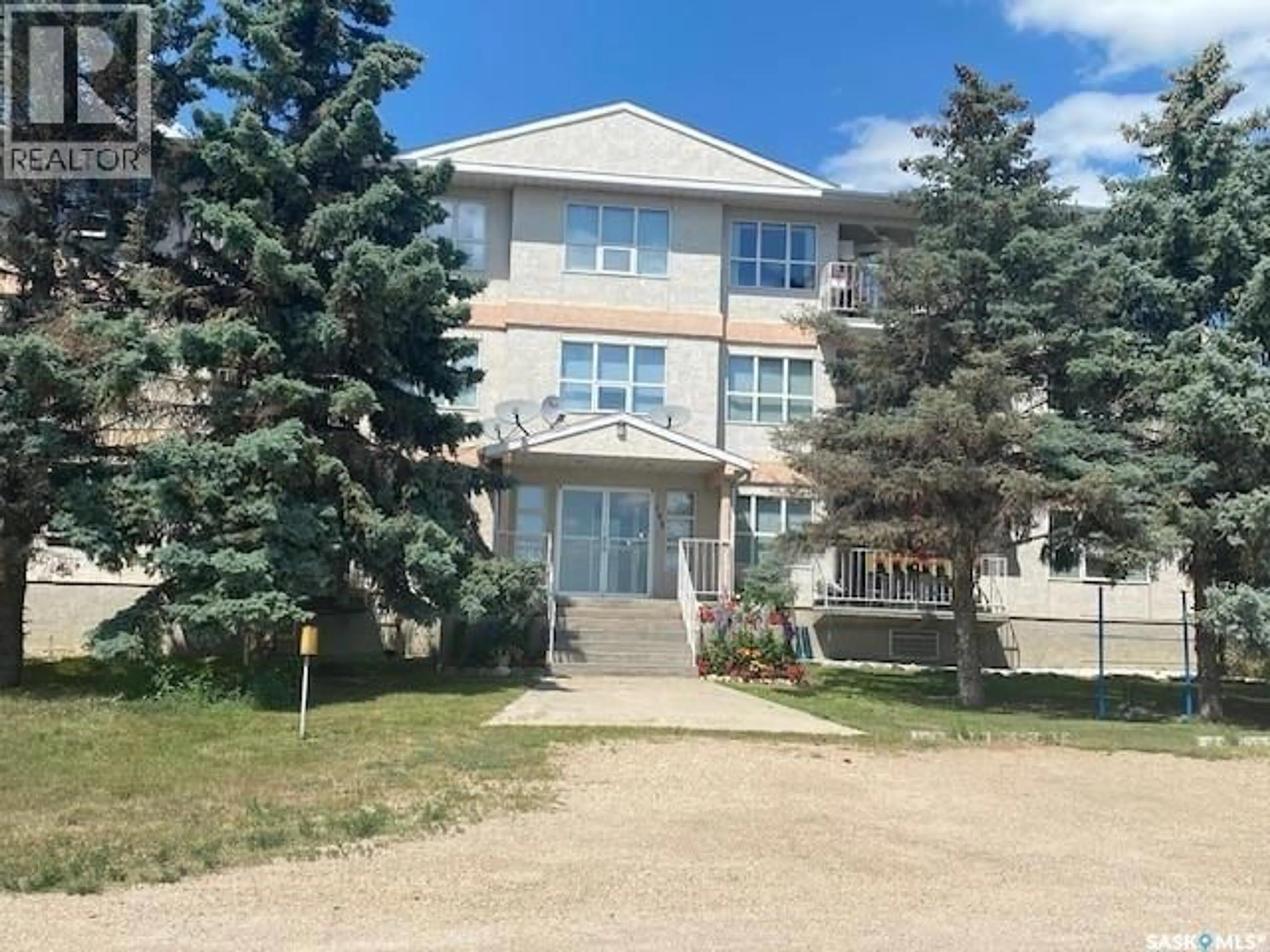 A pic from outside/outdoor area/front of a property/back of a property/a pic from drone, building for 102 - 101 1ST AVENUE, Caronport Saskatchewan S0H0S0