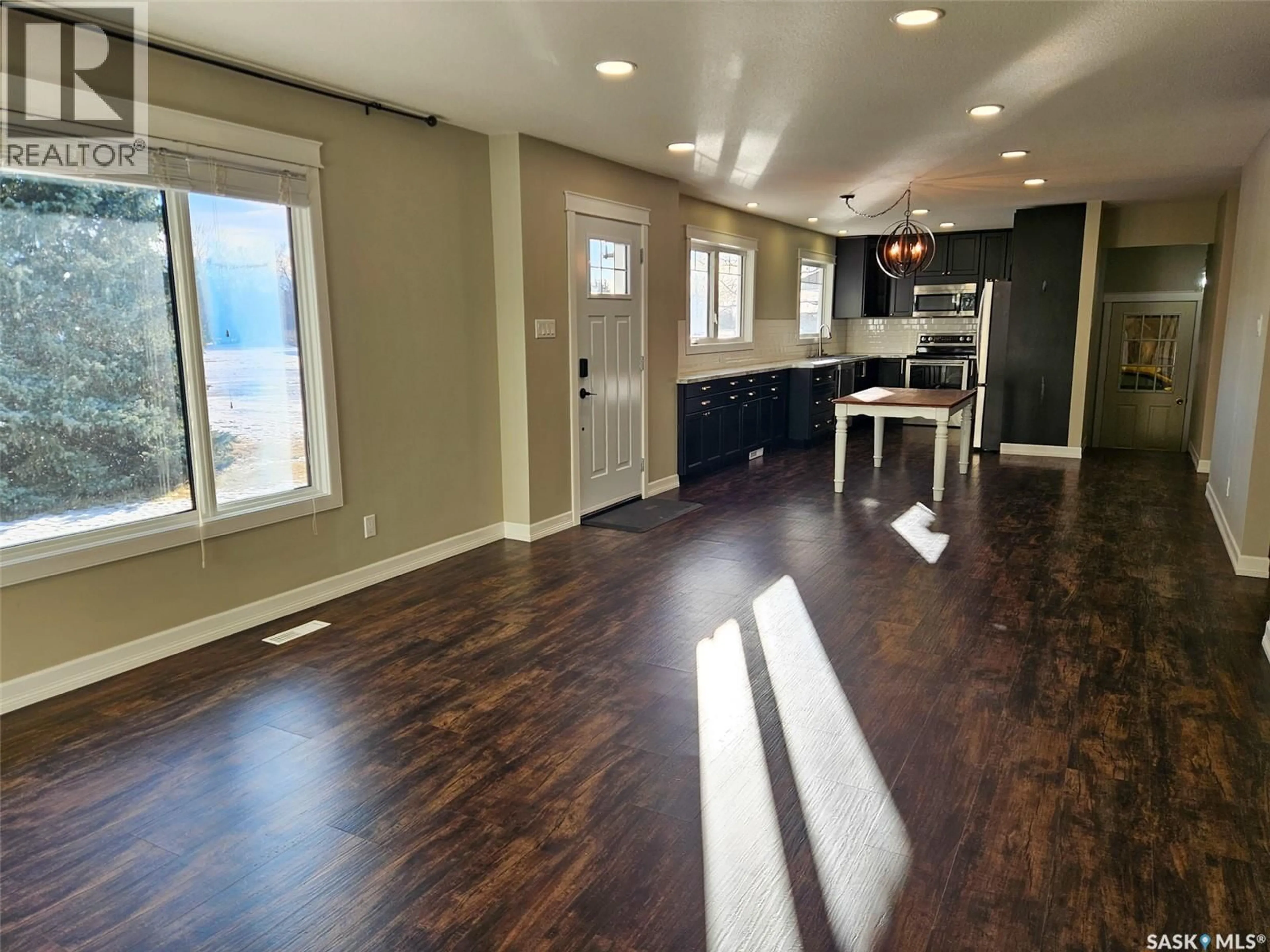 Open concept kitchen, wood/laminate floor for 209 FLOWERVILLE AVENUE, Lac Pelletier Rm No. 107 Saskatchewan S0N0E0