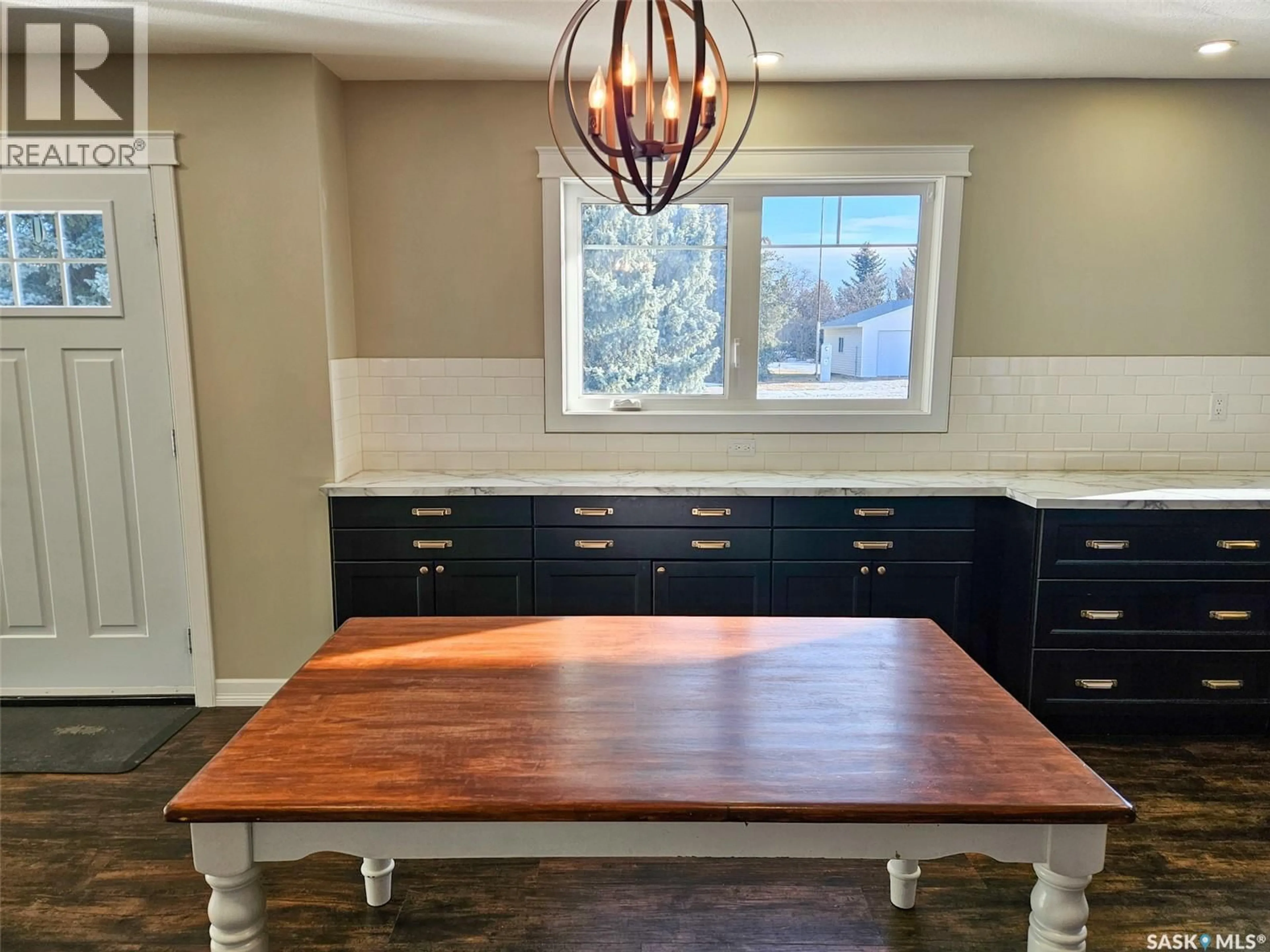 Open concept kitchen, wood/laminate floor for 209 FLOWERVILLE AVENUE, Lac Pelletier Rm No. 107 Saskatchewan S0N0E0