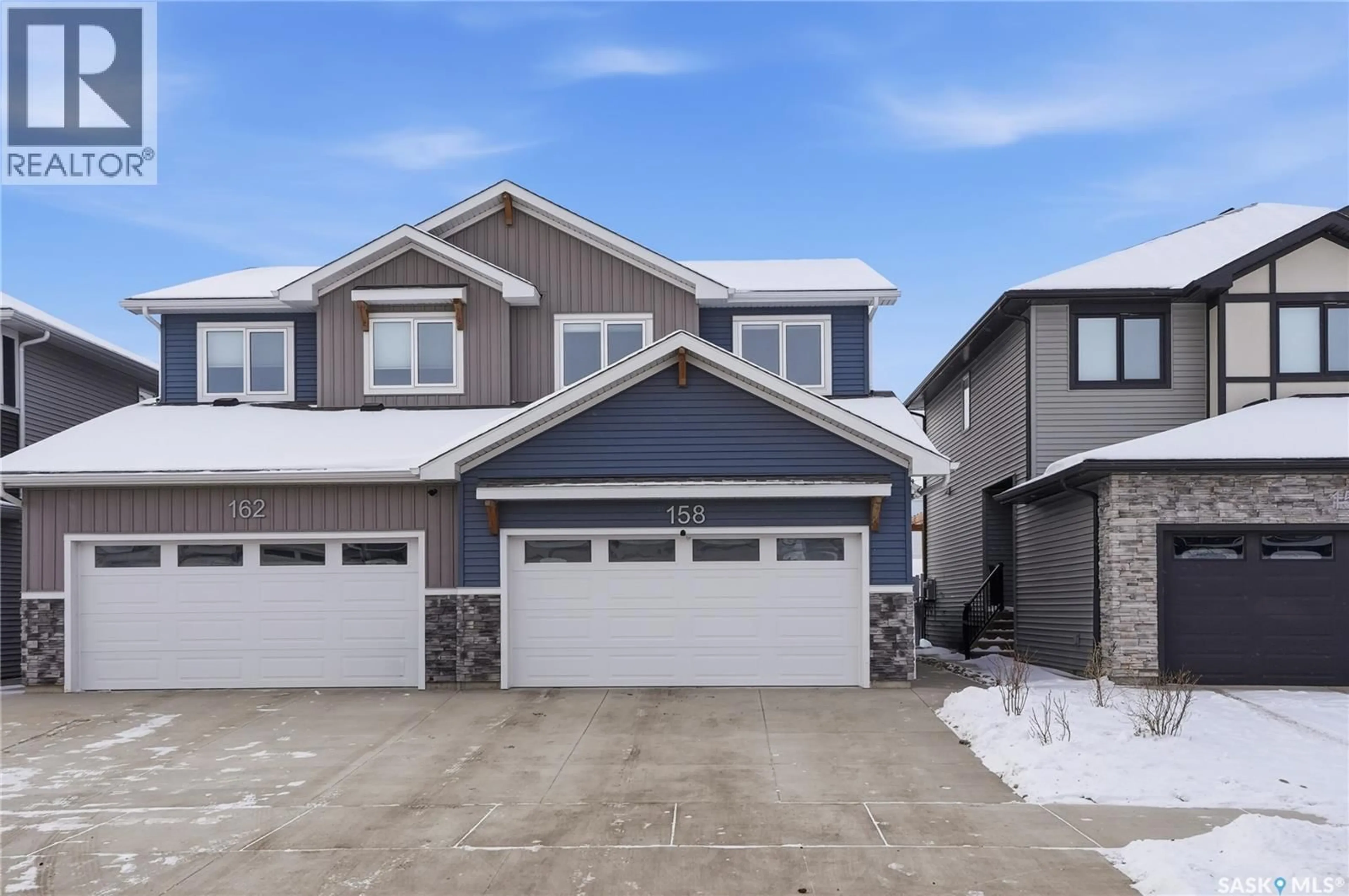 Home with vinyl exterior material, street for 158 COWESSESS ROAD, Saskatoon Saskatchewan S7V1S3
