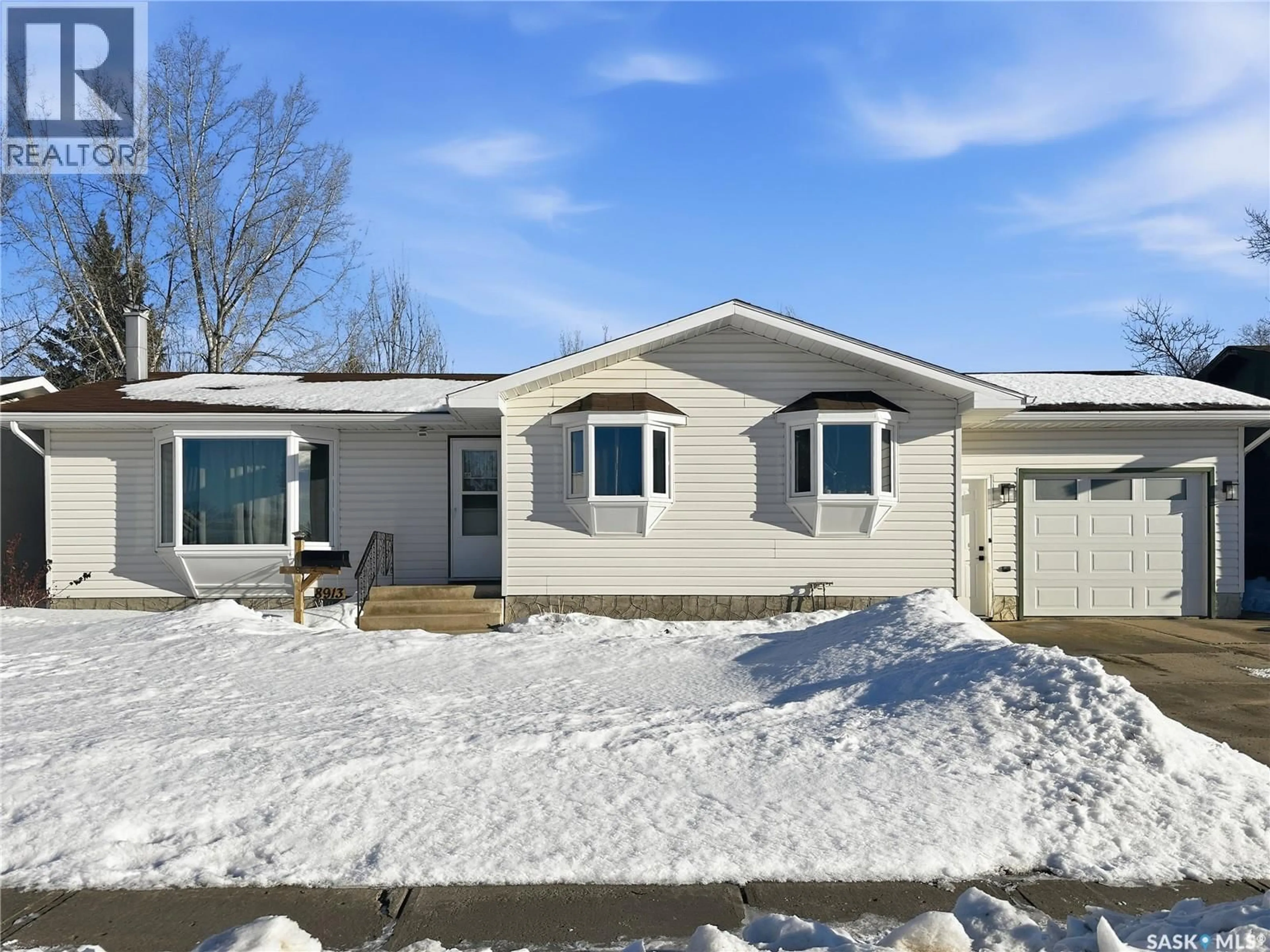 Home with vinyl exterior material, street for 8913 BOWERS DRIVE, North Battleford Saskatchewan S9A3C1