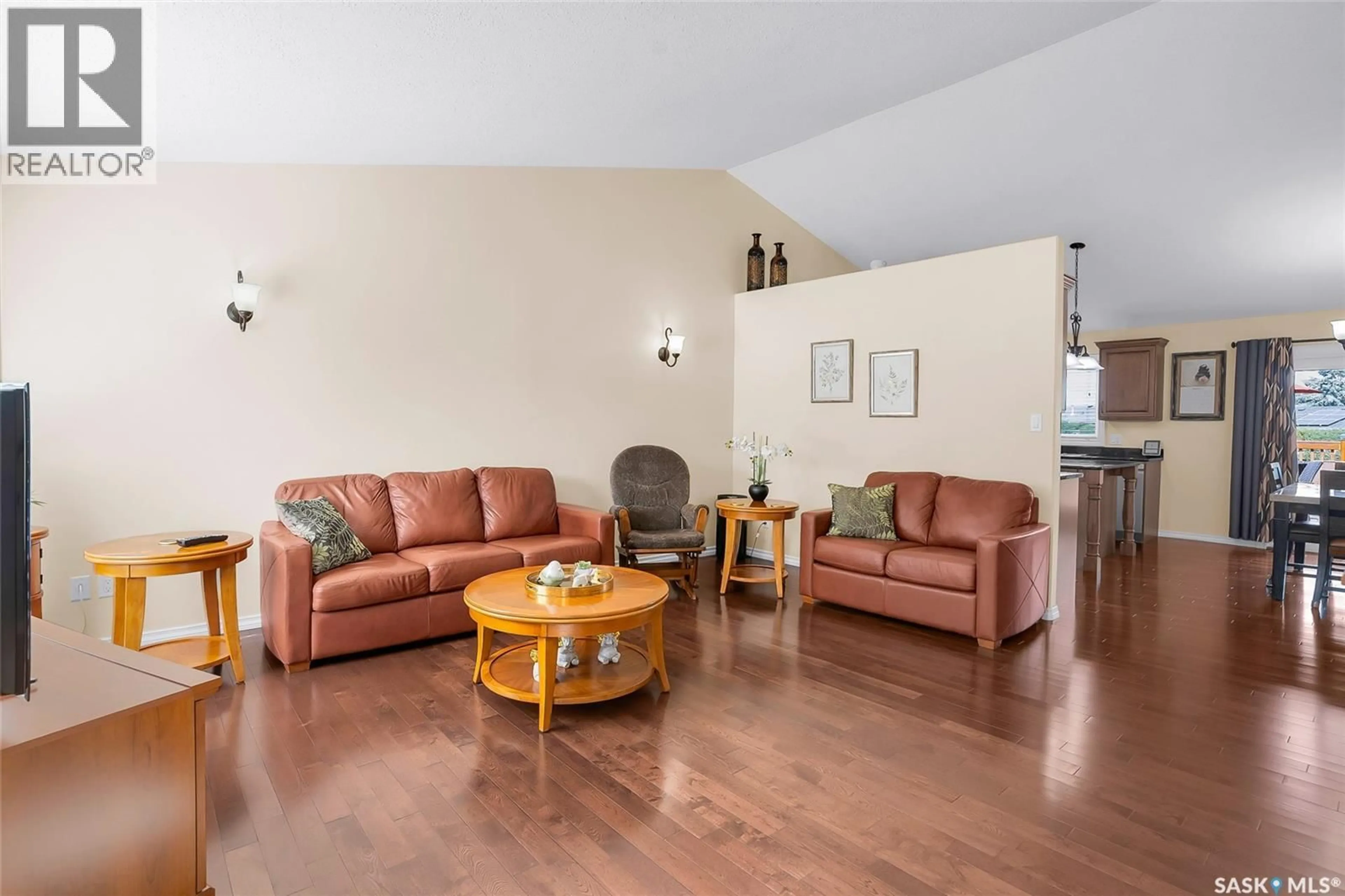 Living room with furniture, wood/laminate floor for 312 2ND AVENUE, Hepburn Saskatchewan S0K1Z0