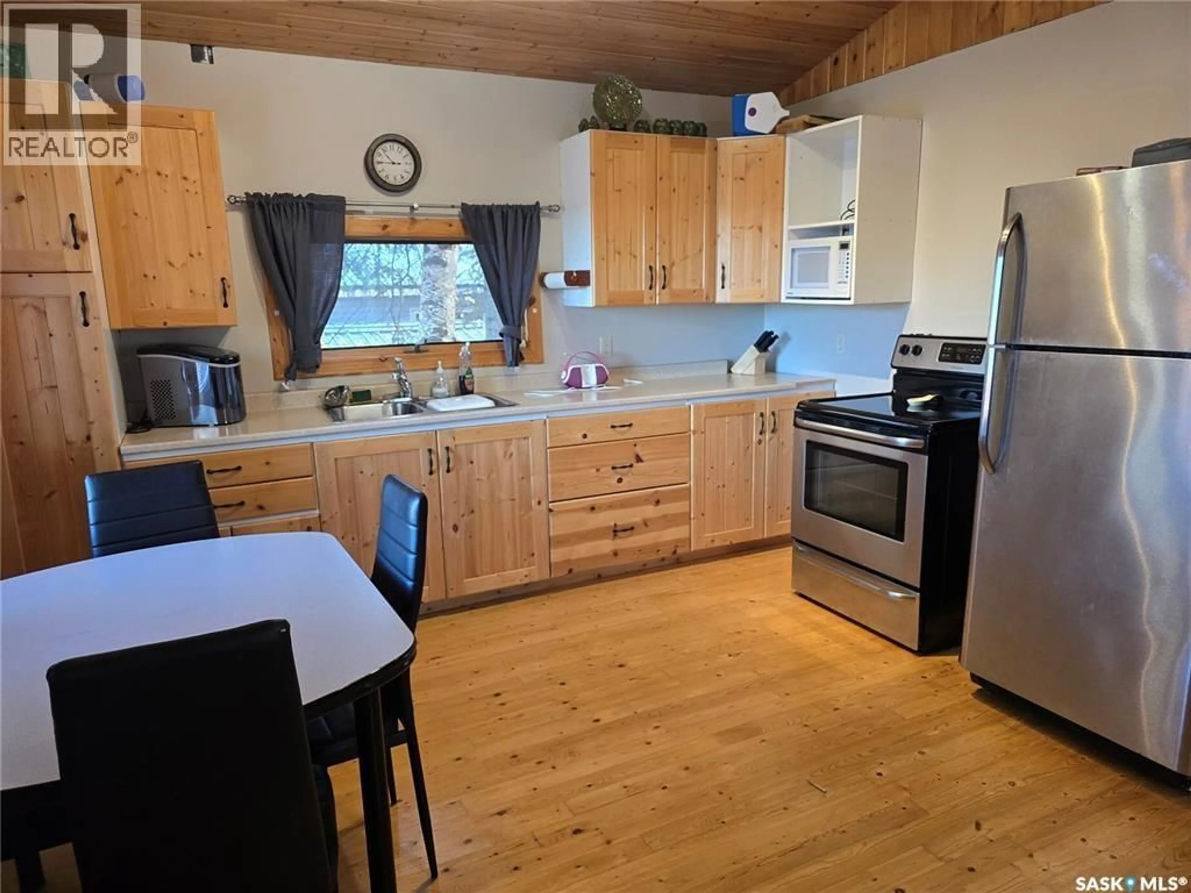 Standard kitchen, wood/laminate floor for 207 PINE DRIVE, Tobin Lake Saskatchewan S0E1E0