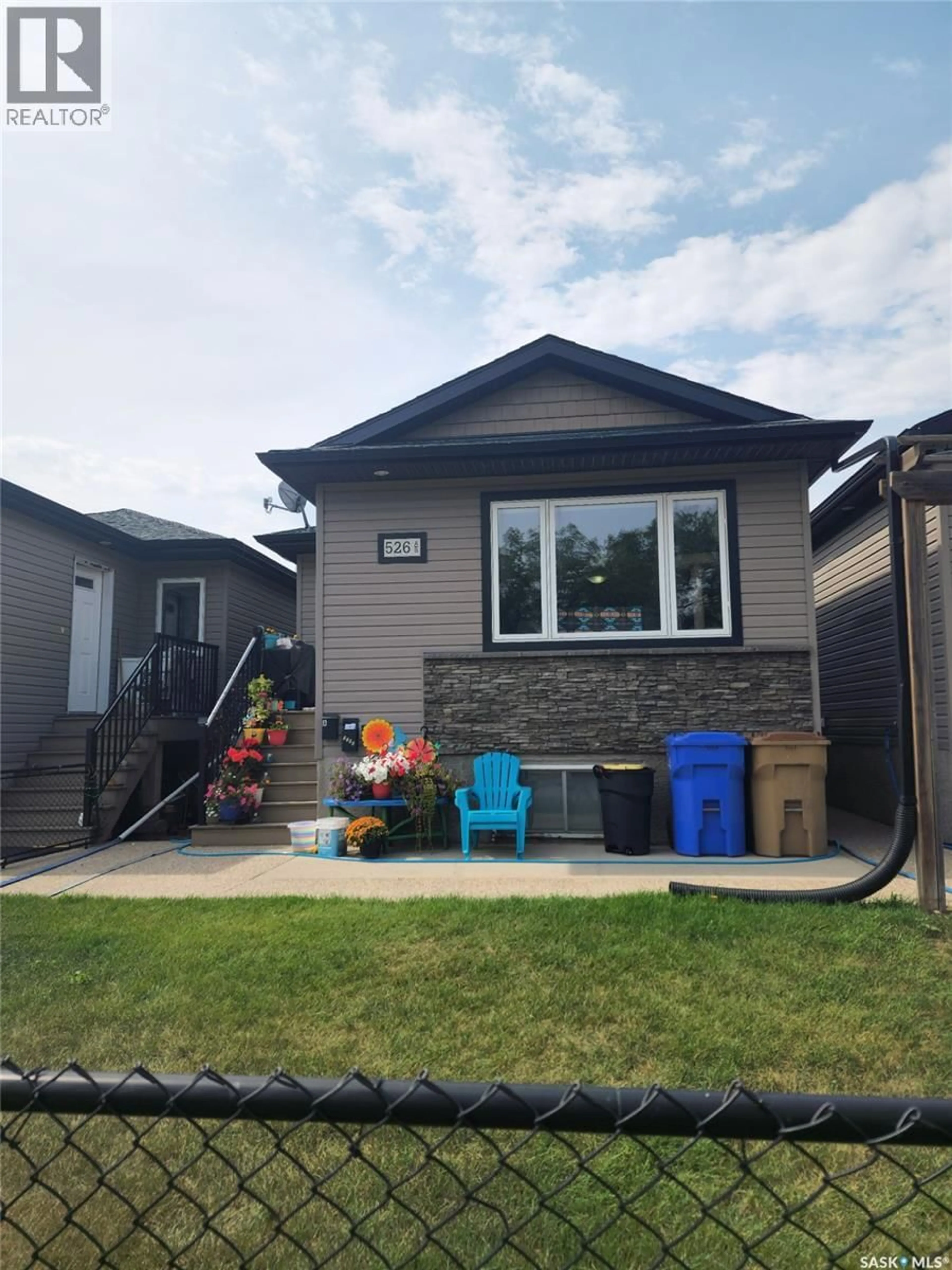 Home with vinyl exterior material, street for 526 TORONTO STREET, Regina Saskatchewan S4R1M6