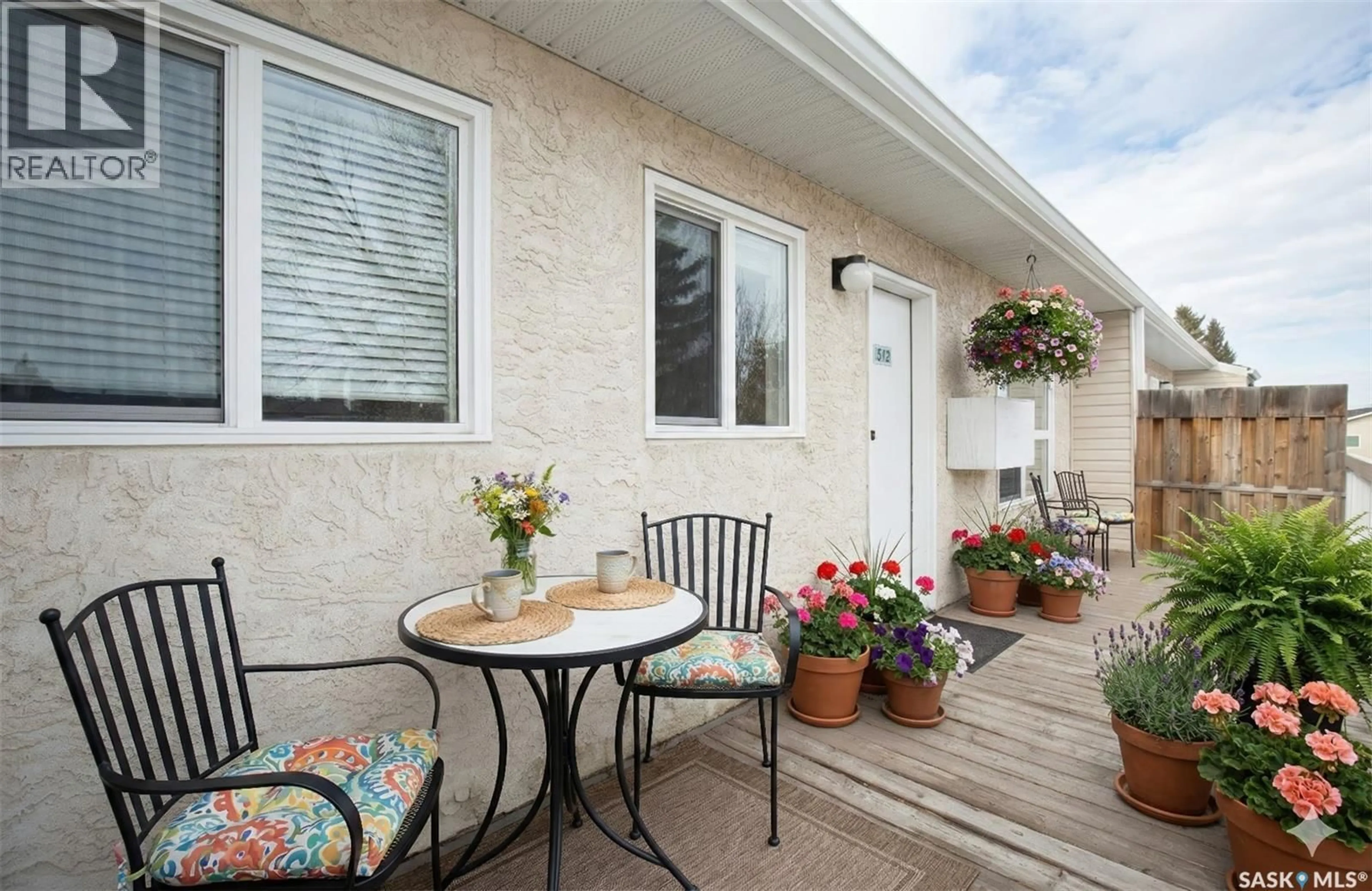 Patio, street for 67 - 312 WOOD LILY DRIVE, Moose Jaw Saskatchewan S6J1G6