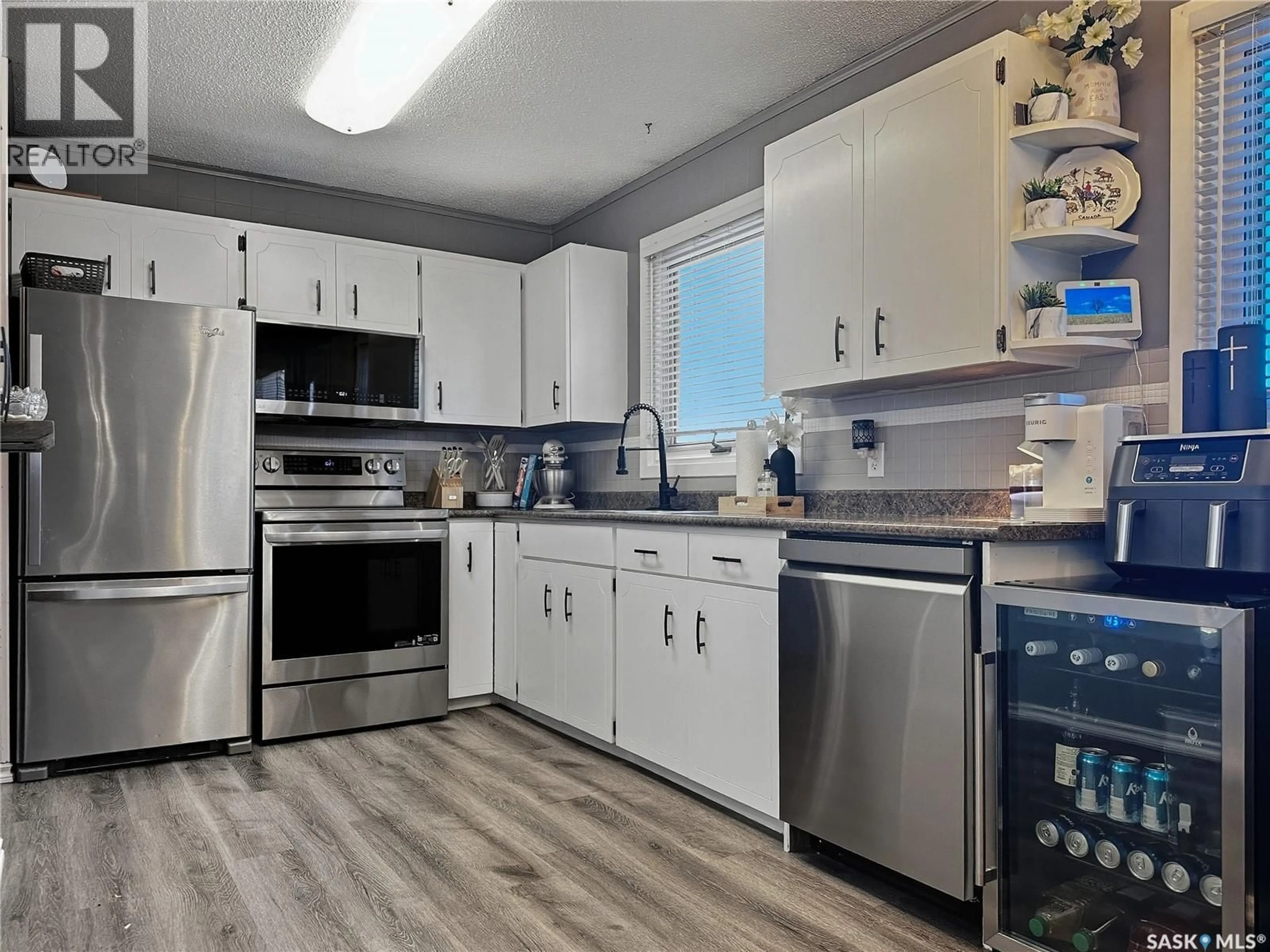 Open concept kitchen, unknown for 252 30TH STREET, Battleford Saskatchewan S0M0E0