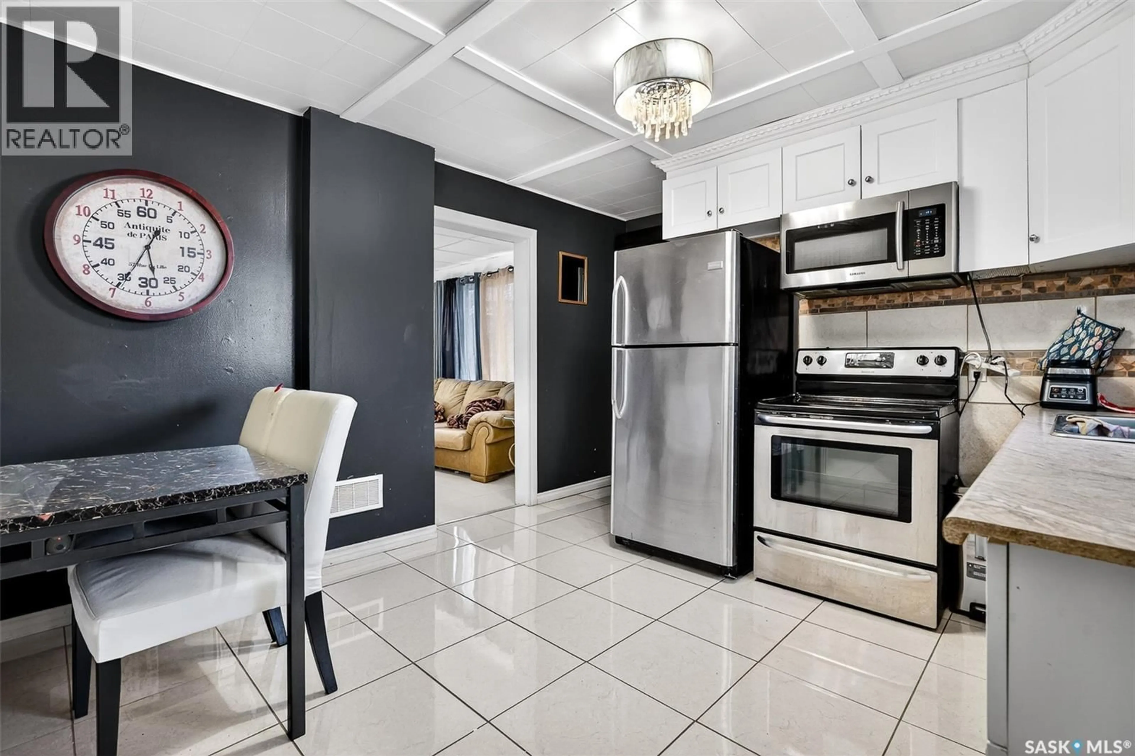 Open concept kitchen, ceramic/tile floor for 174 OMINICA STREET, Moose Jaw Saskatchewan S6H1X2