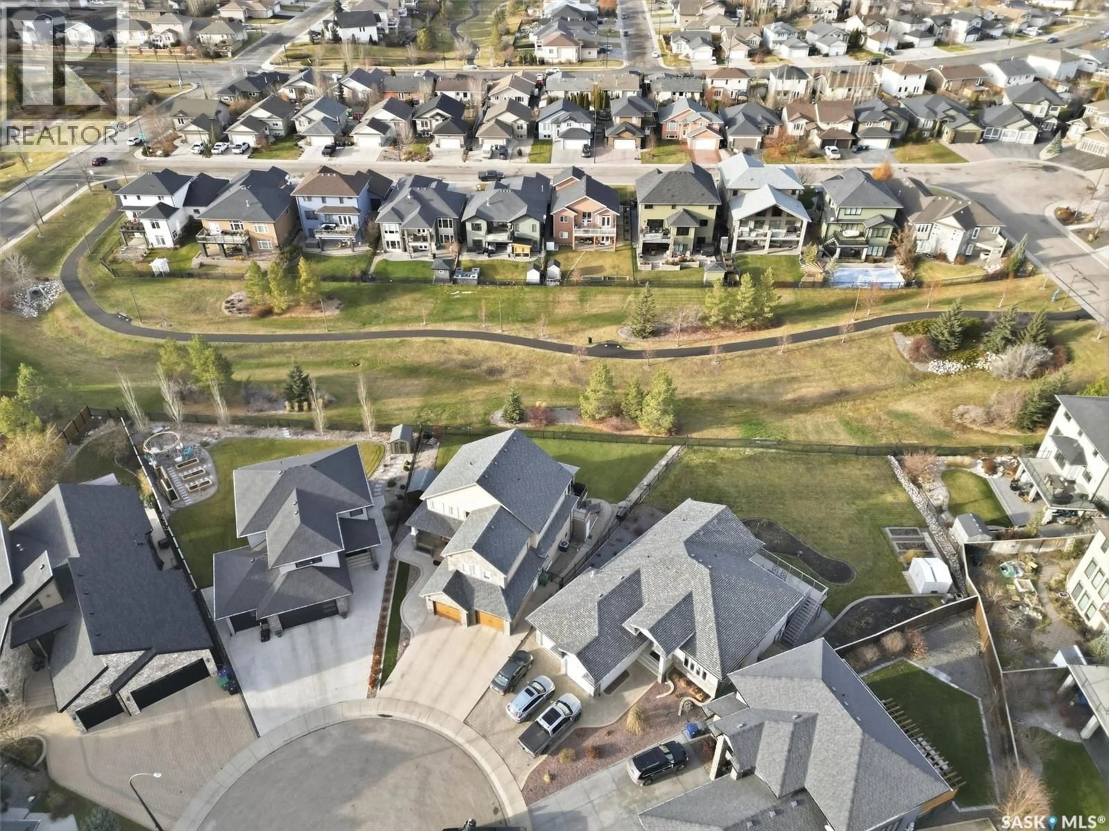 A pic from outside/outdoor area/front of a property/back of a property/a pic from drone, street for 519 BENNION TERRACE, Saskatoon Saskatchewan S7W0H2