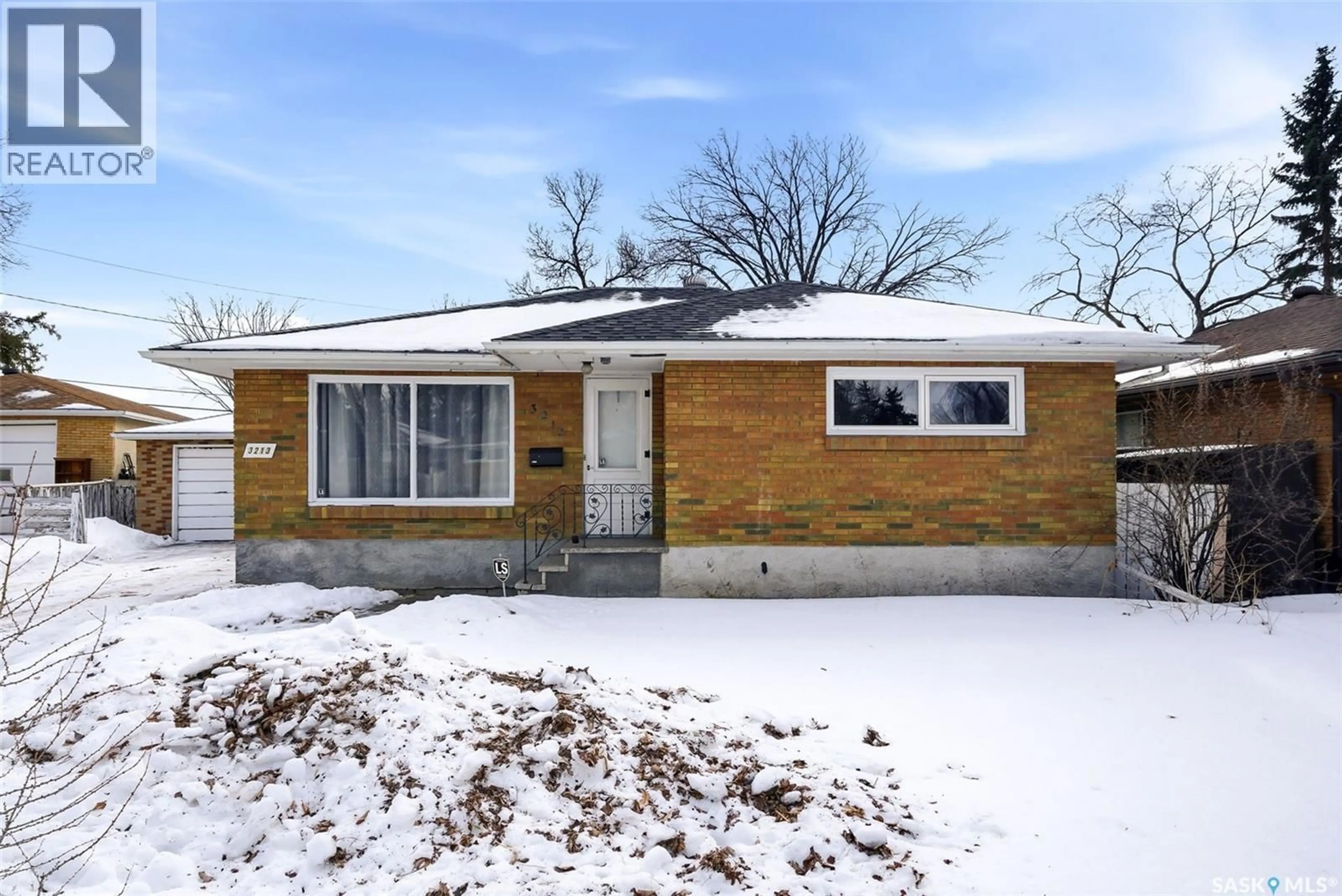 Home with brick exterior material, street for 3213 PATRICIA AVENUE, Regina Saskatchewan S4R3V8