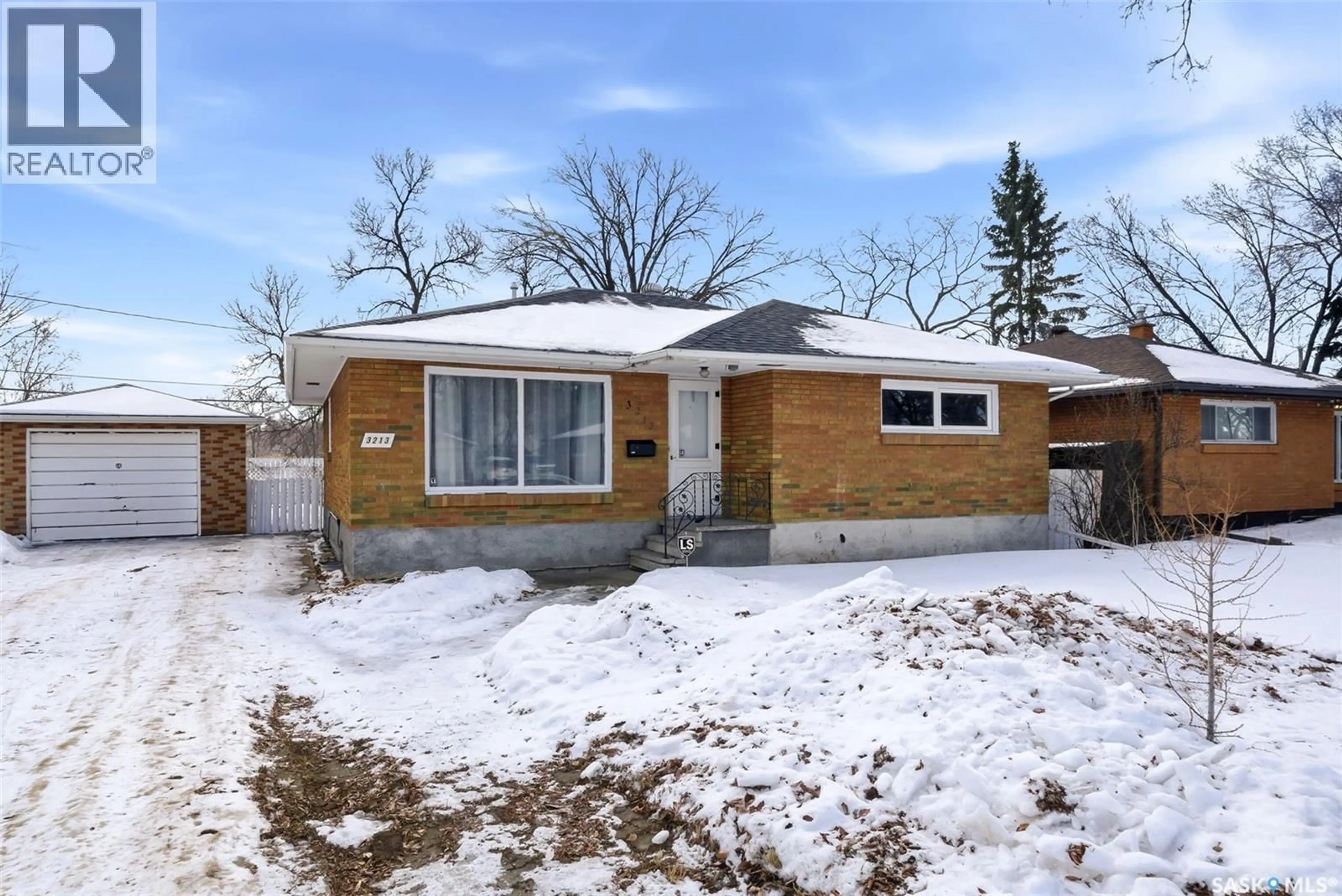Home with brick exterior material, street for 3213 PATRICIA AVENUE, Regina Saskatchewan S4R3V8