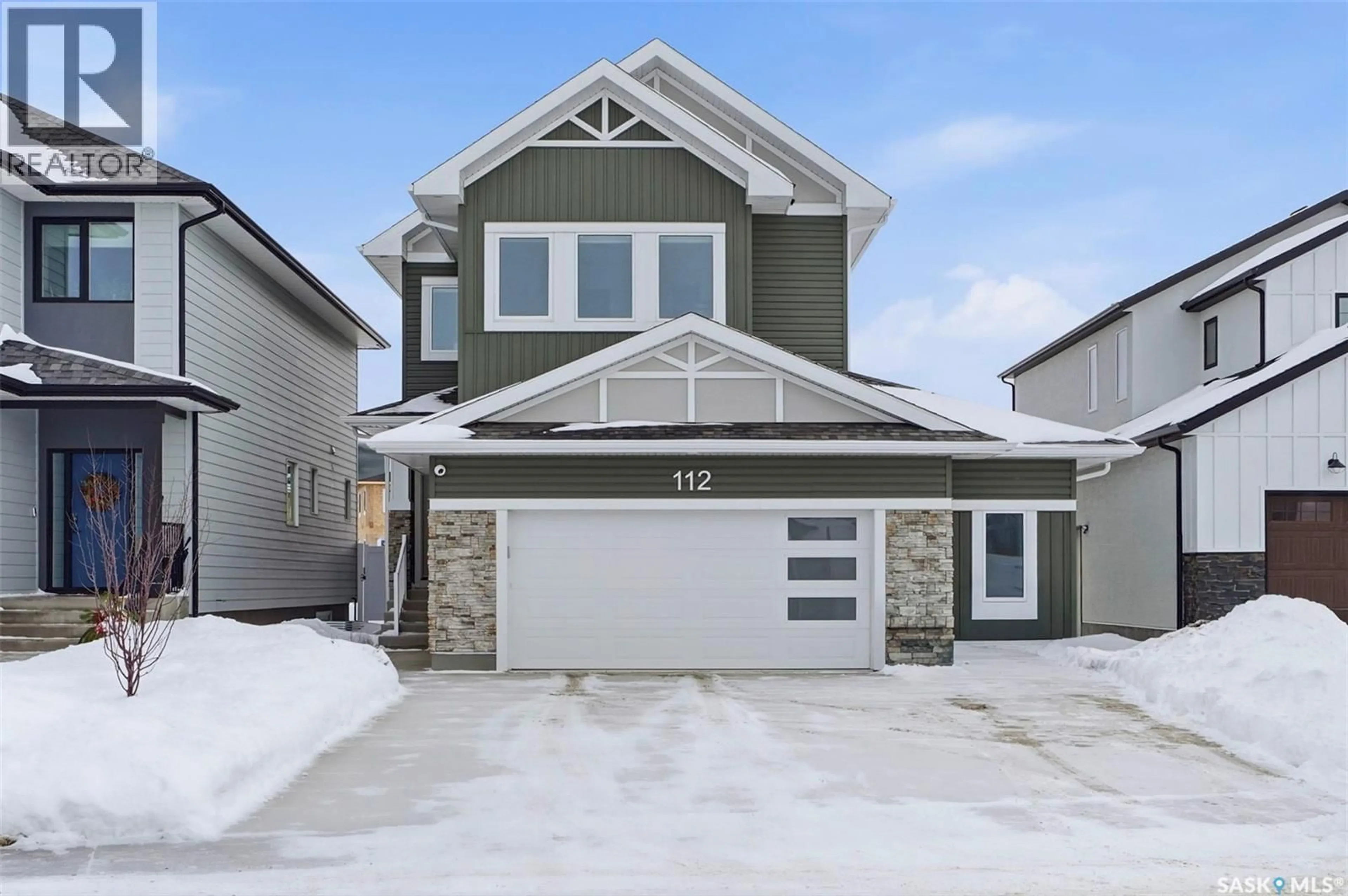 Home with vinyl exterior material, street for 112 FORSEY AVENUE, Saskatoon Saskatchewan S7V1C8