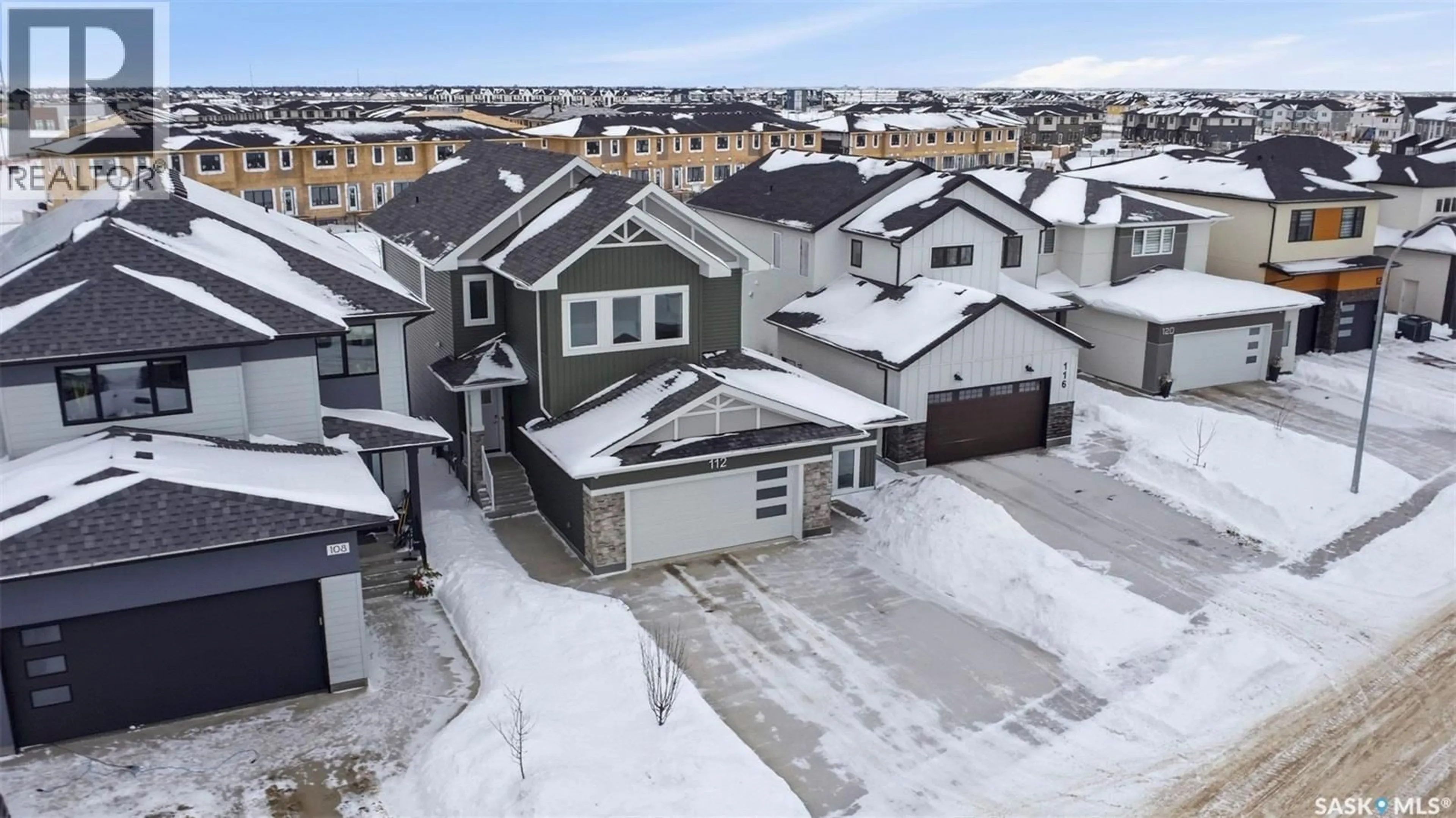 A pic from outside/outdoor area/front of a property/back of a property/a pic from drone, street for 112 FORSEY AVENUE, Saskatoon Saskatchewan S7V1C8