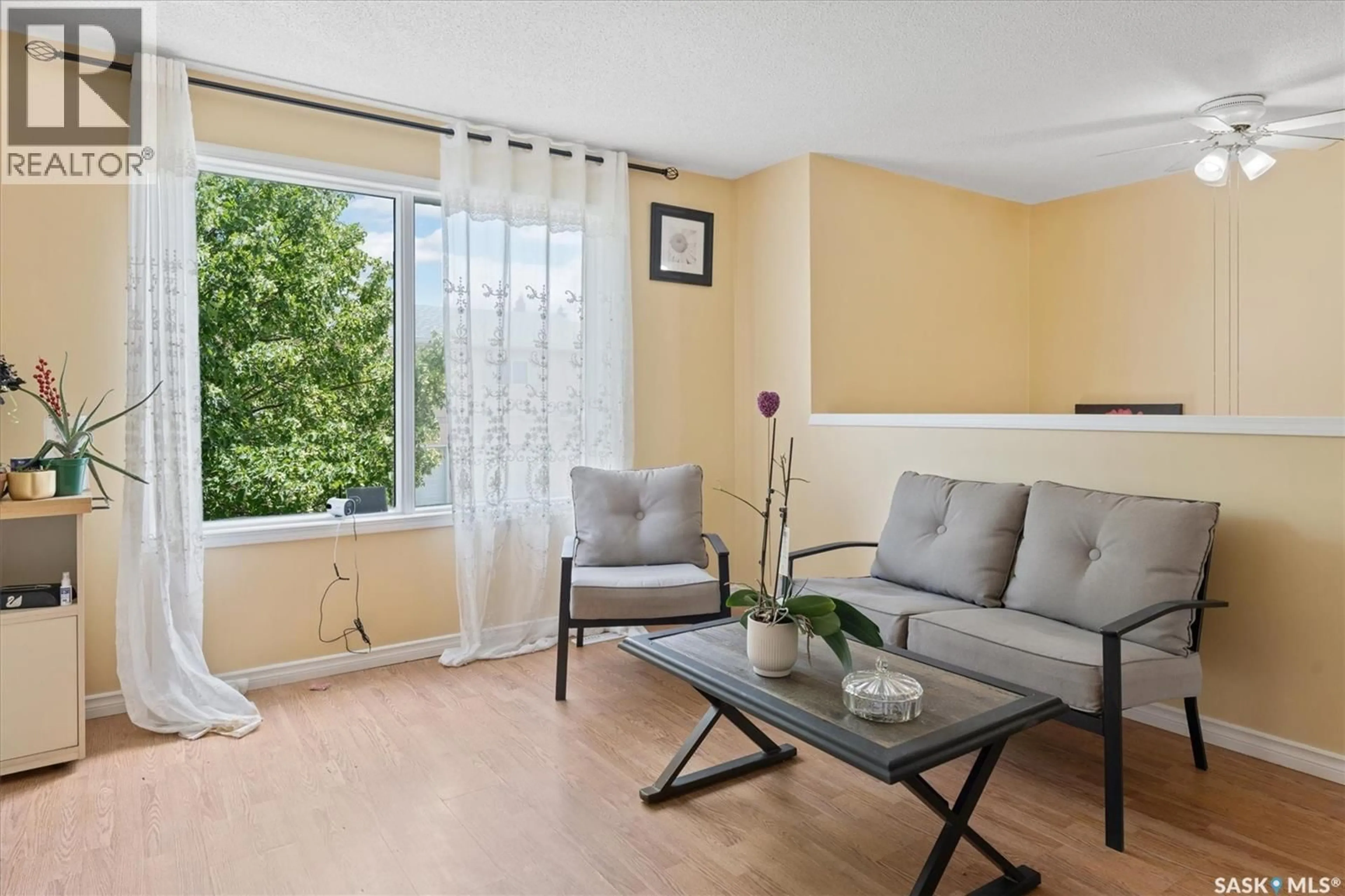 Living room with furniture, unknown for 610 - 107 PEREHUDOFF CRESCENT, Saskatoon Saskatchewan S7N4H5