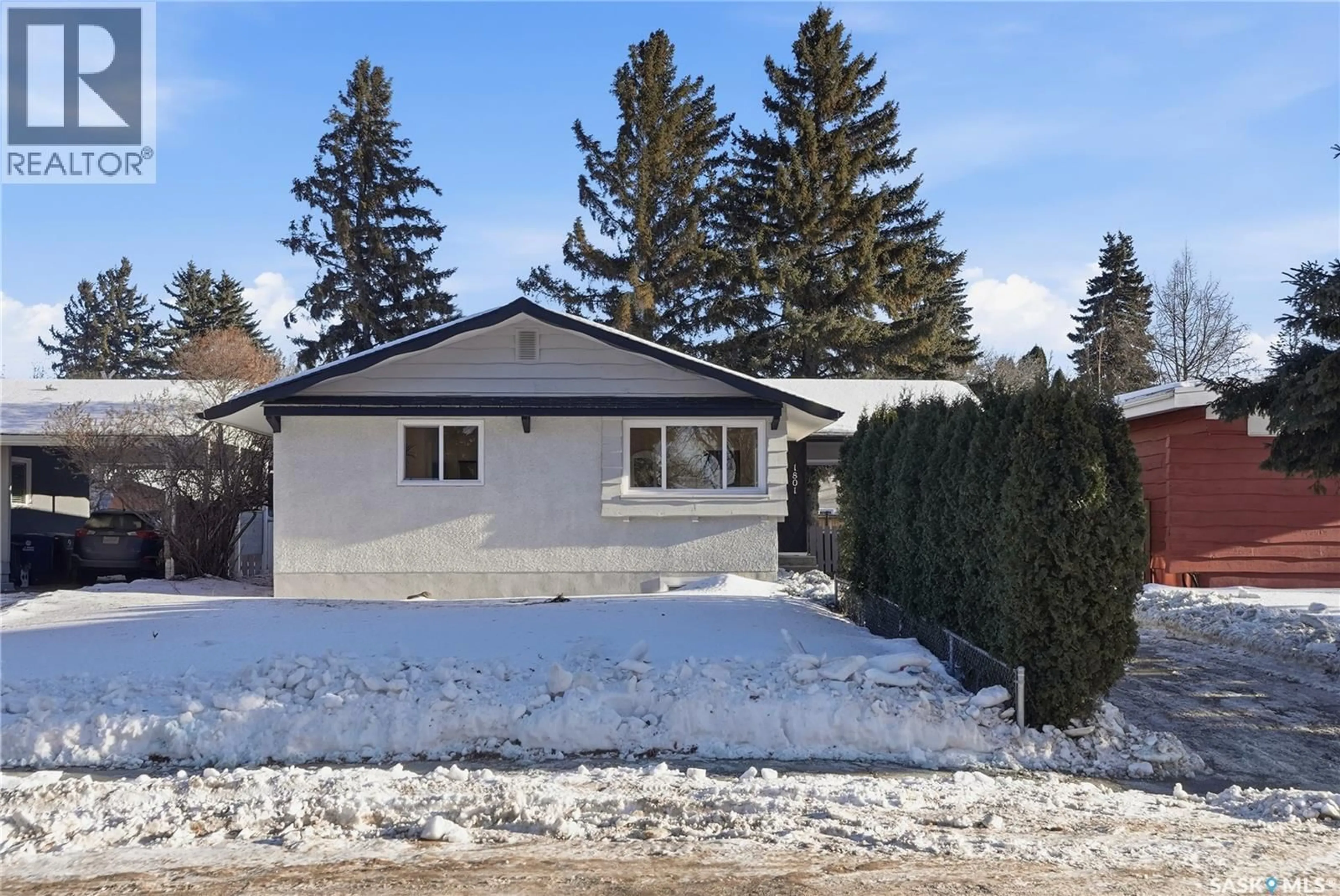 Home with vinyl exterior material, street for 1801 MADDEN AVENUE, Saskatoon Saskatchewan S7H3M7