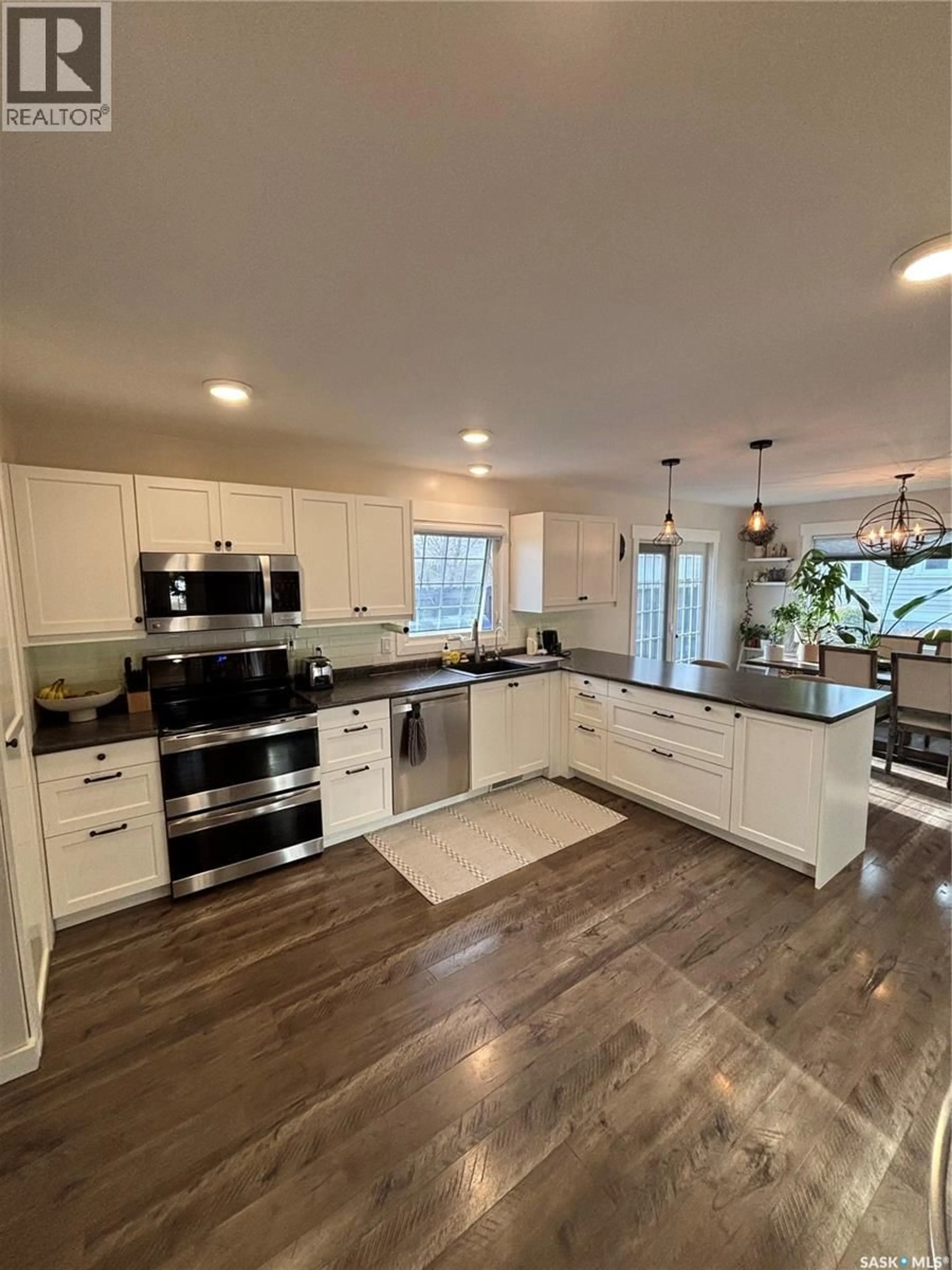 Open concept kitchen, ceramic/tile floor for 845 PROSPECT AVENUE, Oxbow Saskatchewan S0C2B0