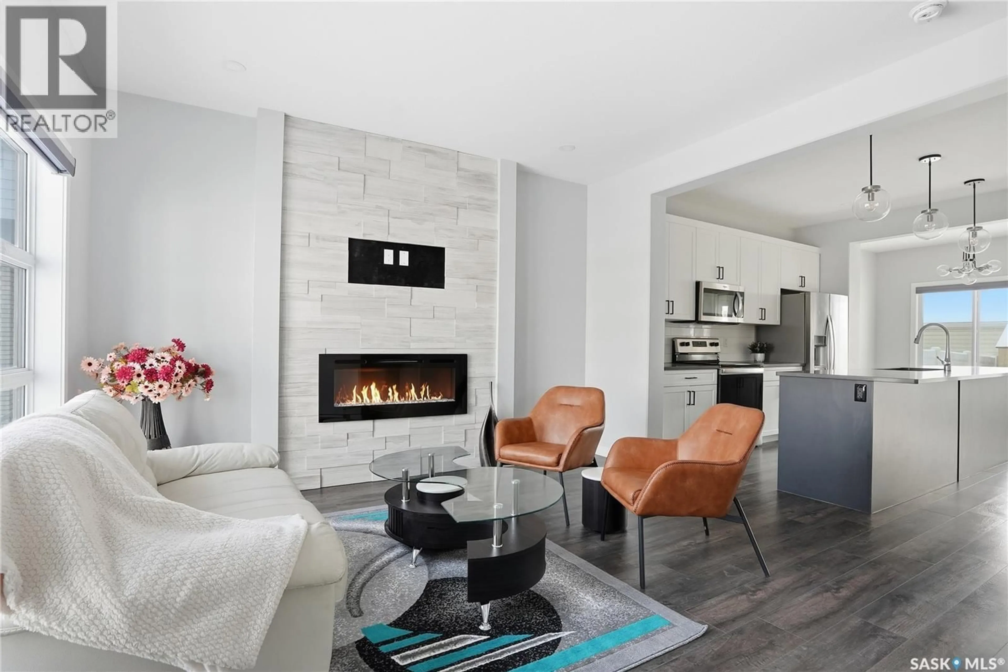 Living room with furniture, ceramic/tile floor for 306 BRIGHTON BOULEVARD, Saskatoon Saskatchewan S7V0V8