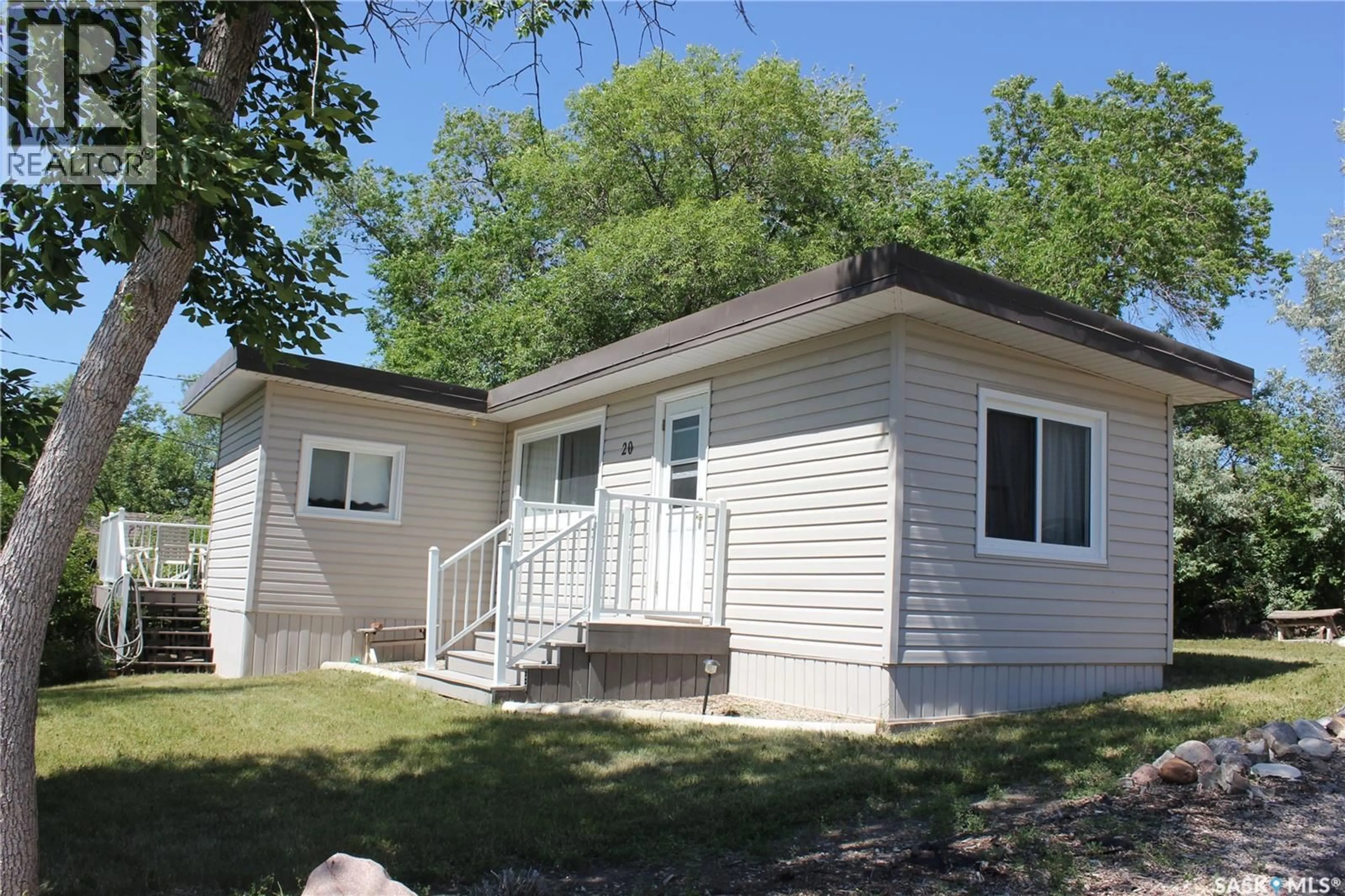 Home with vinyl exterior material, street for 20 LAKESHORE DRIVE, Kannata Valley Saskatchewan S0G4L0