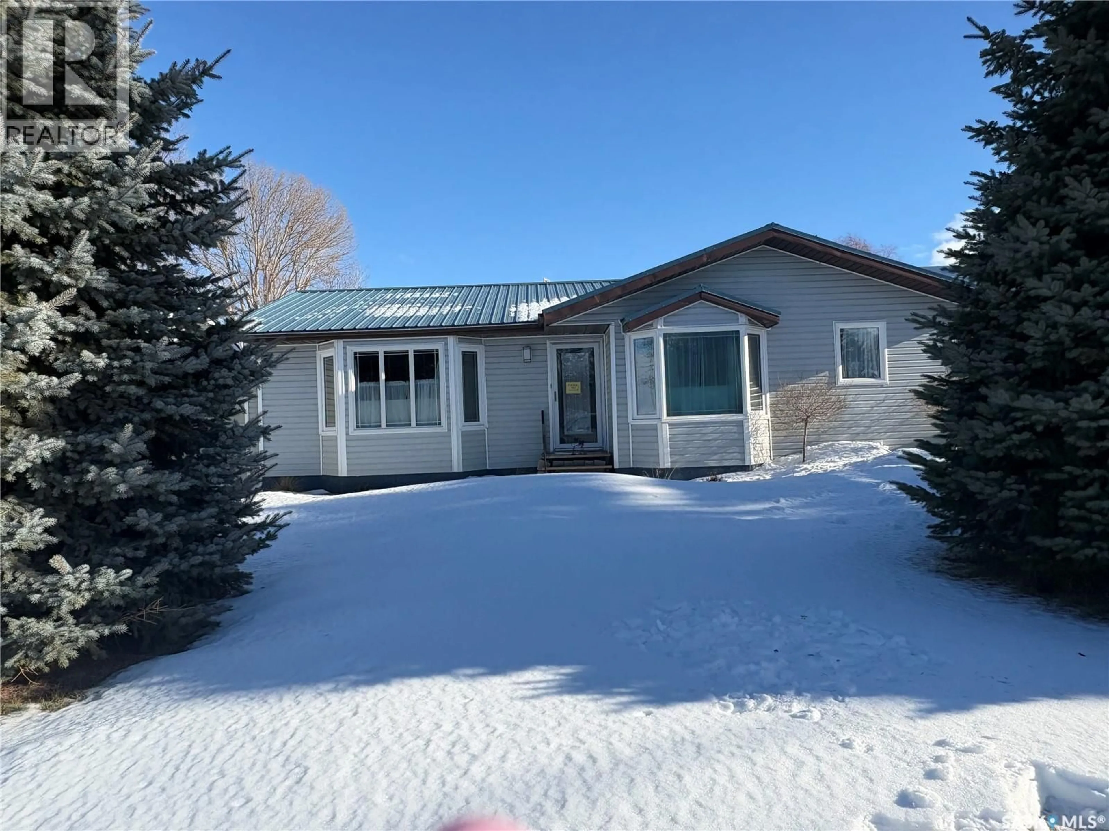 Home with vinyl exterior material, street for 409 SHERBROOKE STREET, Wolseley Saskatchewan S0G5H0