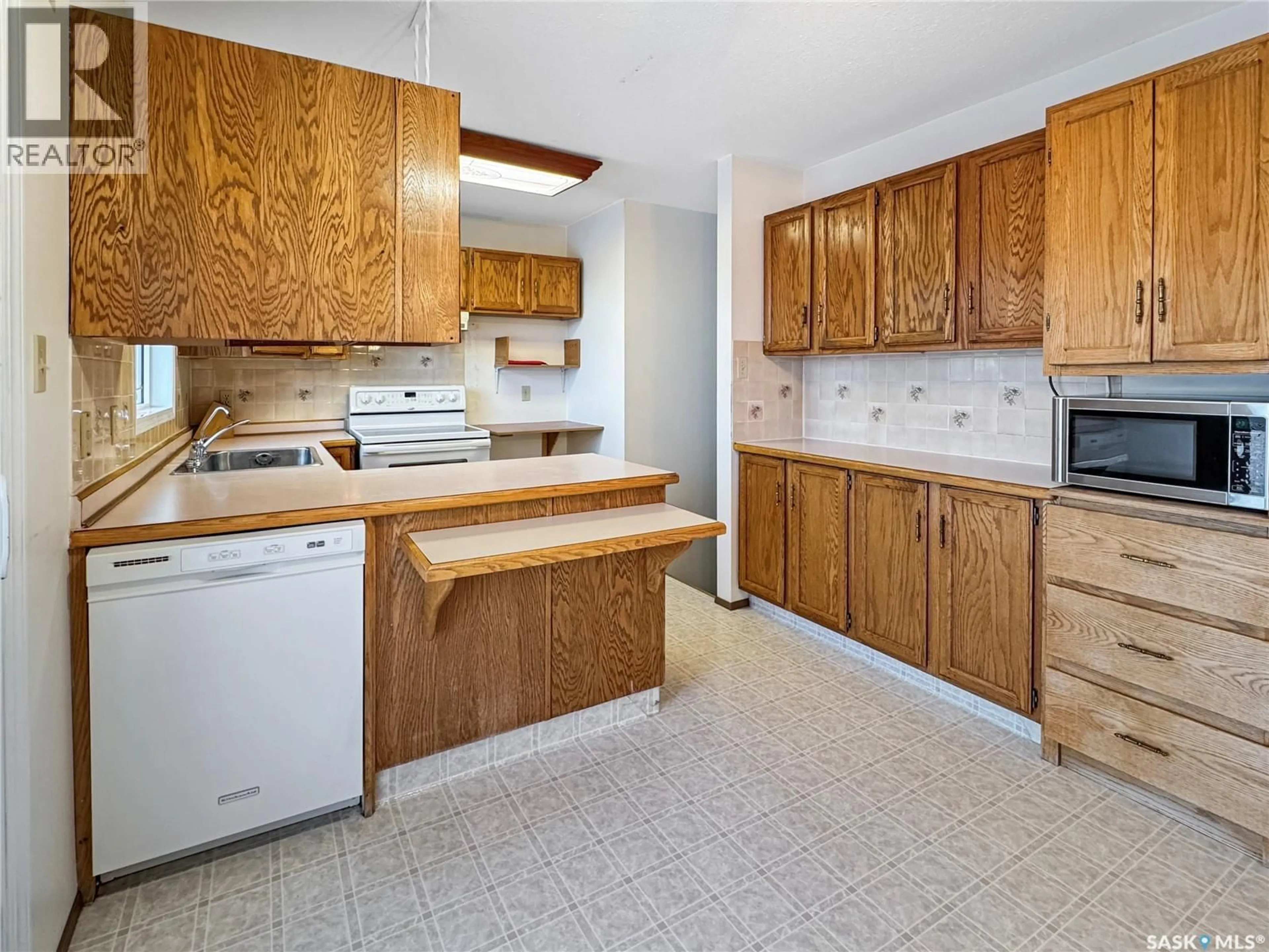Standard kitchen, unknown for 11342 CLARK DRIVE, North Battleford Saskatchewan S9A3P3