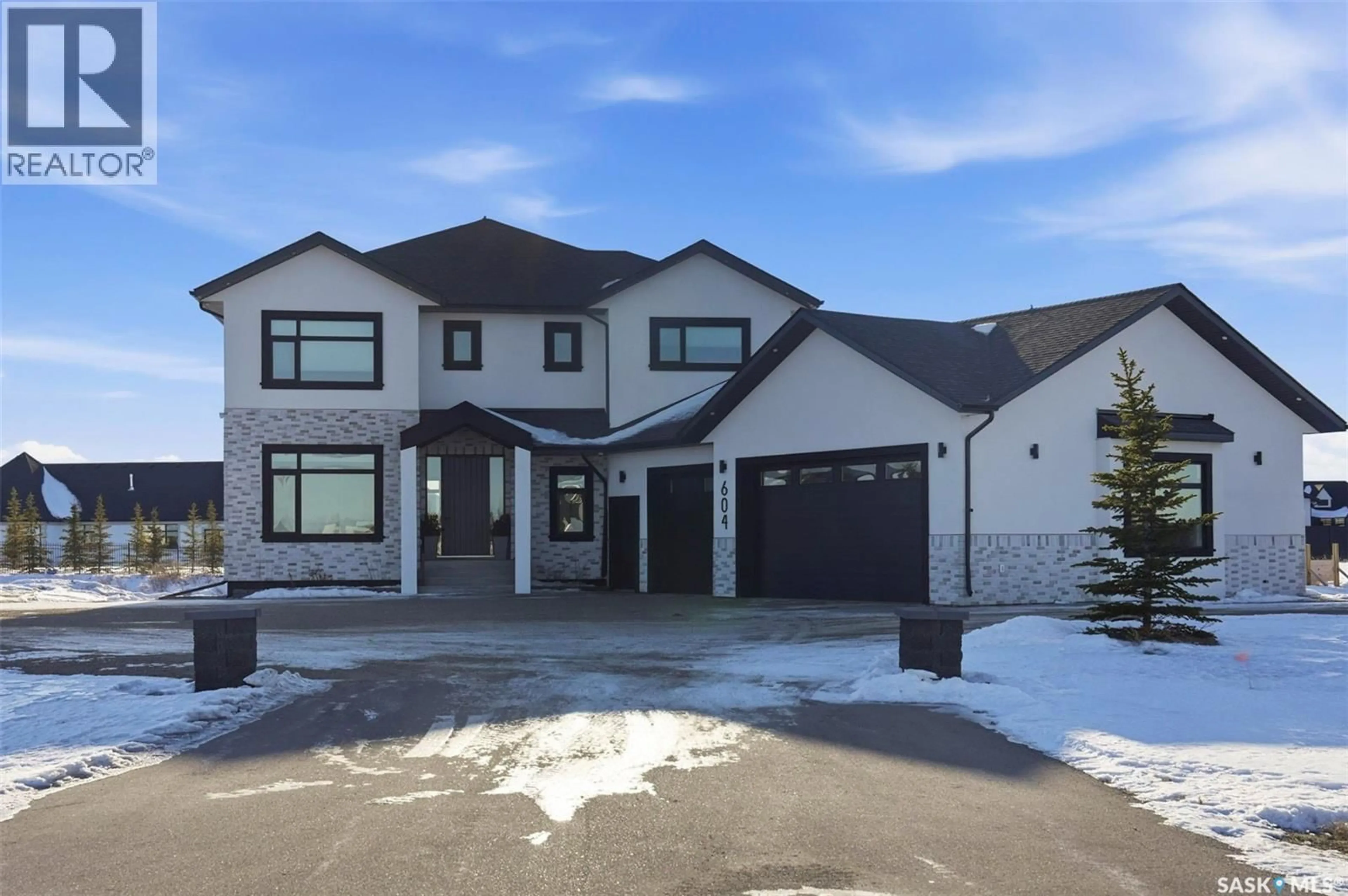 Home with brick exterior material, street for 604 EDGEMONT WAY, Corman Park Rm No. 344 Saskatchewan S7T0Z8