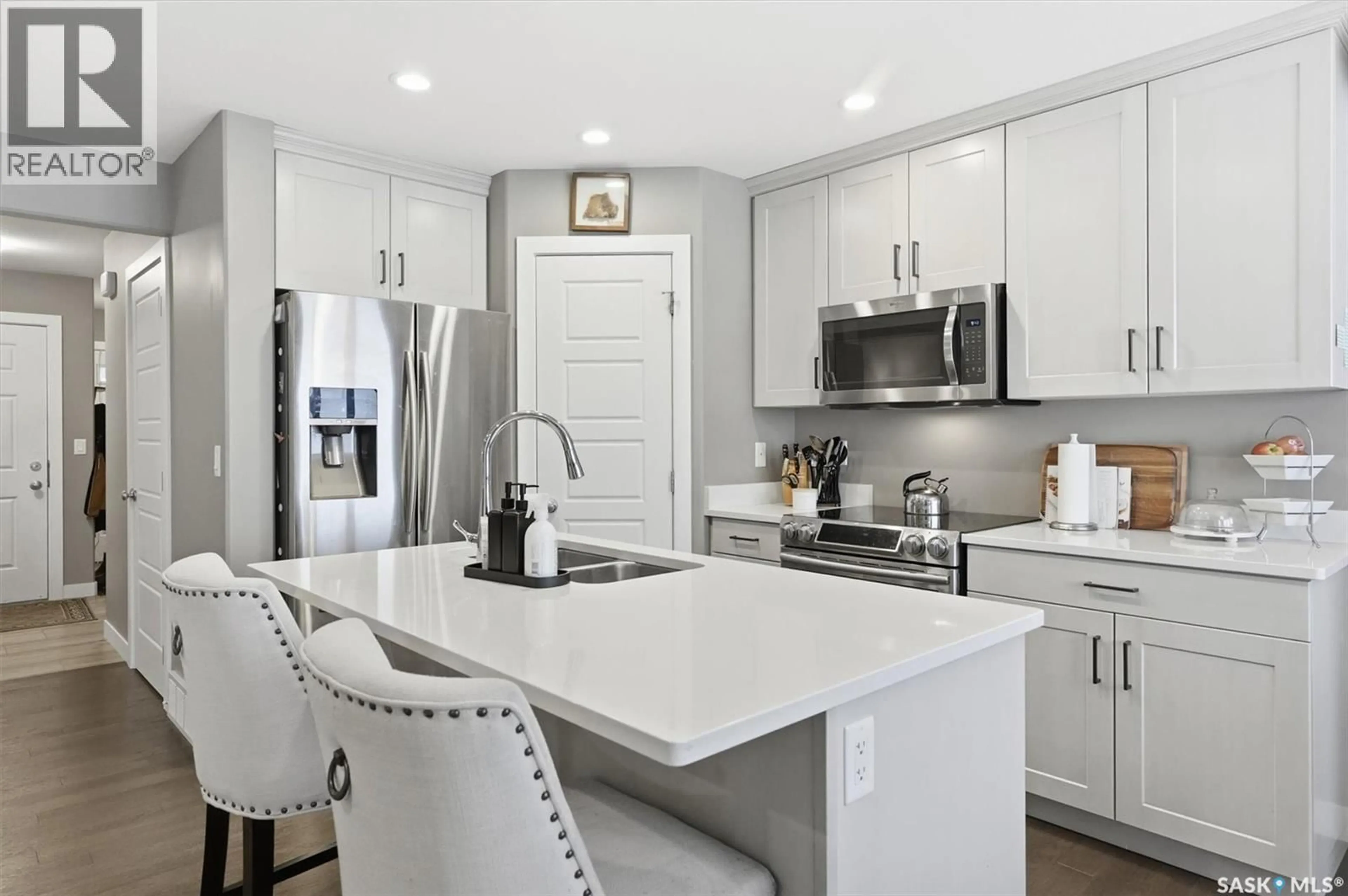 Open concept kitchen, ceramic/tile floor for 1025 KOLYNCHUK CRESCENT, Saskatoon Saskatchewan S7T0X4