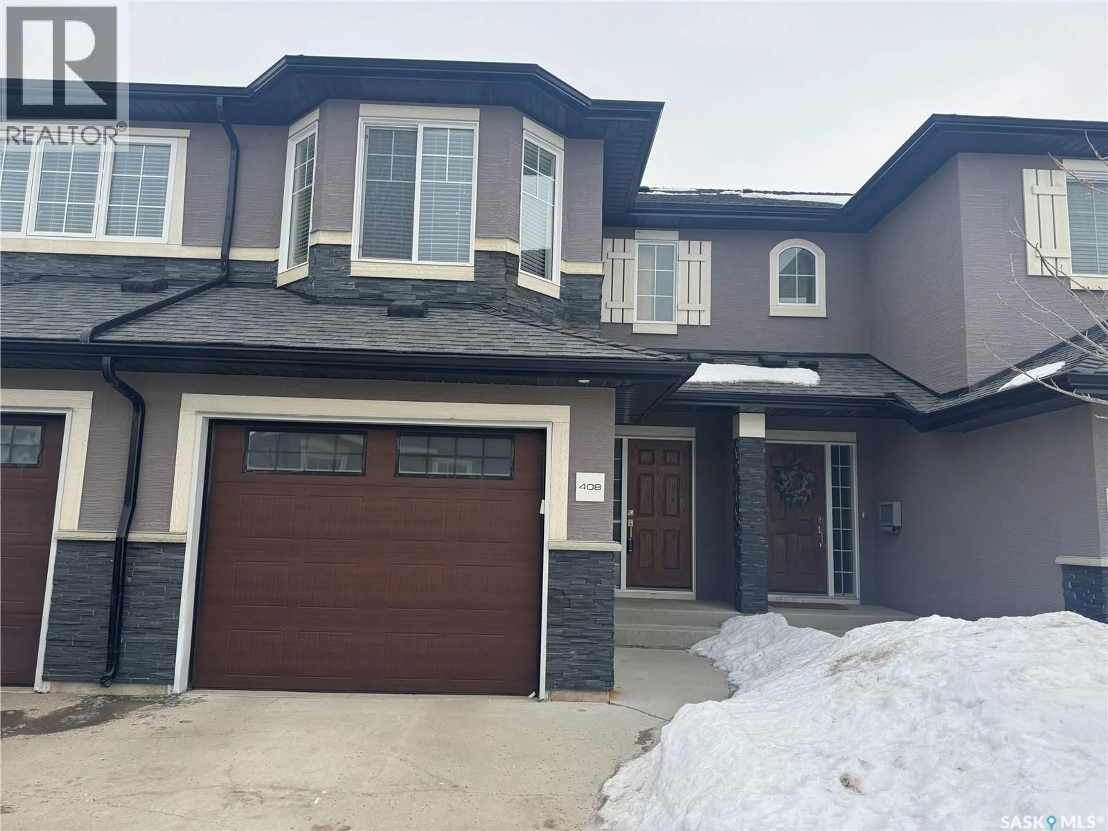 Home with vinyl exterior material, street for 1303 - 408 PATON CRESCENT, Saskatoon Saskatchewan S7W0B8