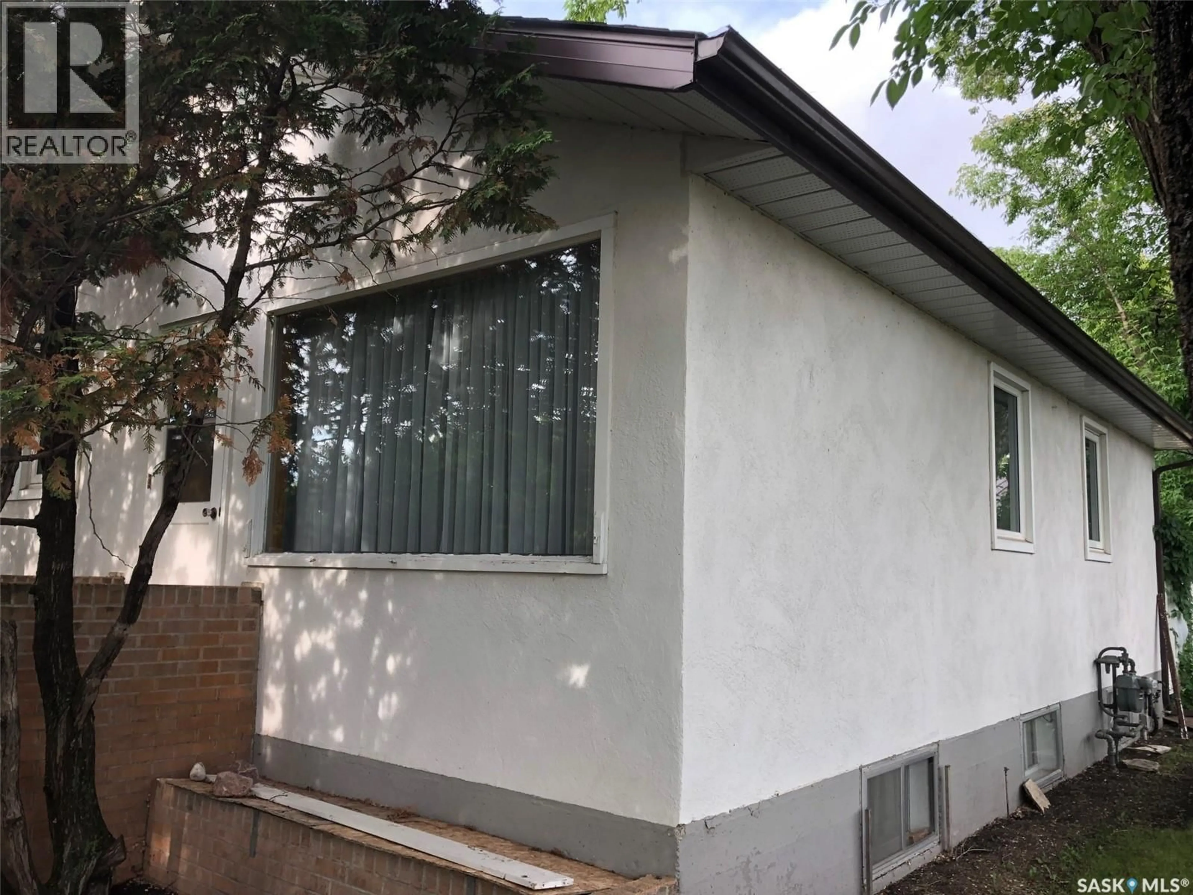 Home with vinyl exterior material, building for 414 CHURCHILL STREET, Hudson Bay Saskatchewan S0E0Y0