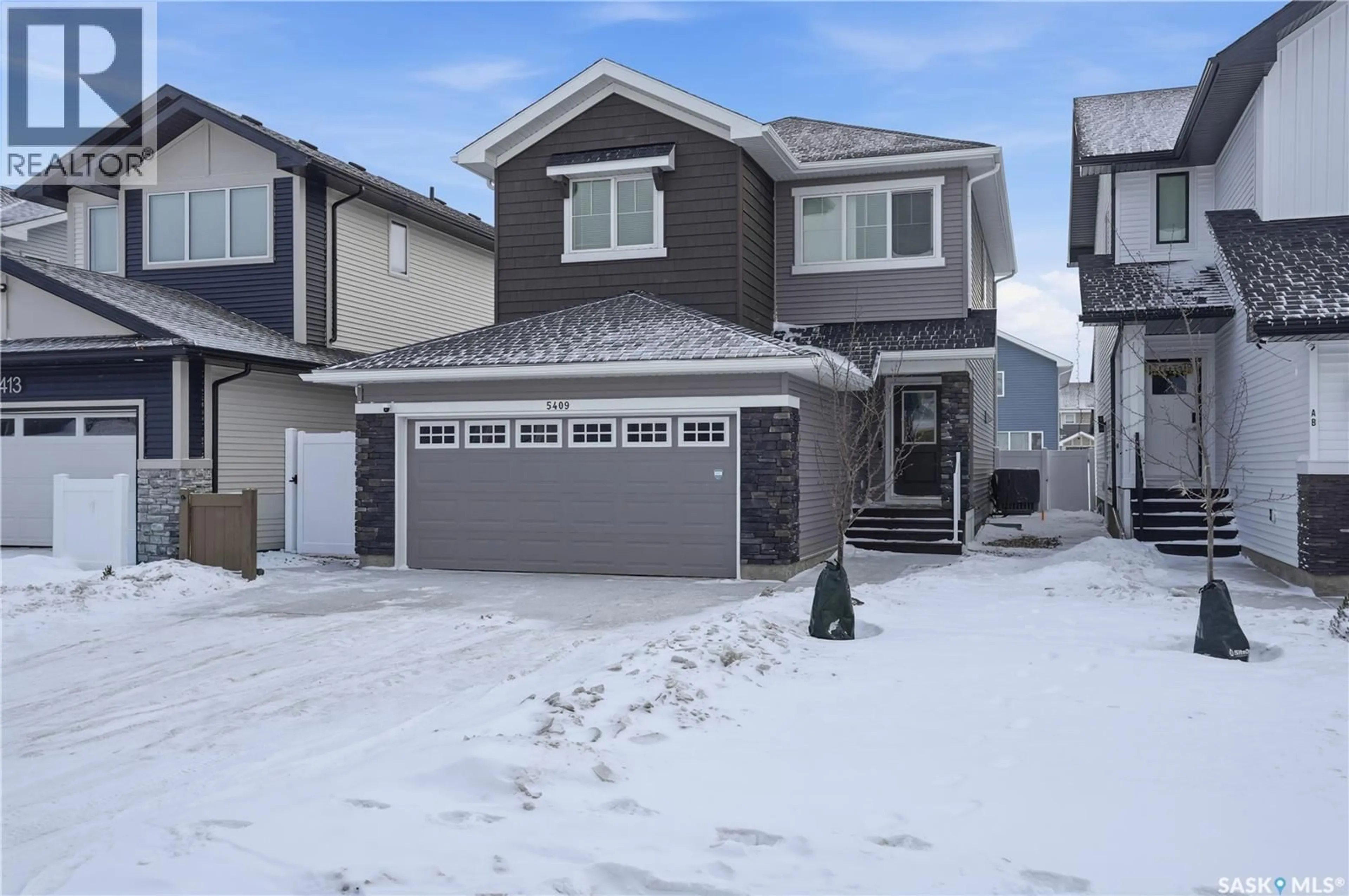 Home with vinyl exterior material, street for 5409 NICHOLSON AVENUE, Regina Saskatchewan S4V4B3