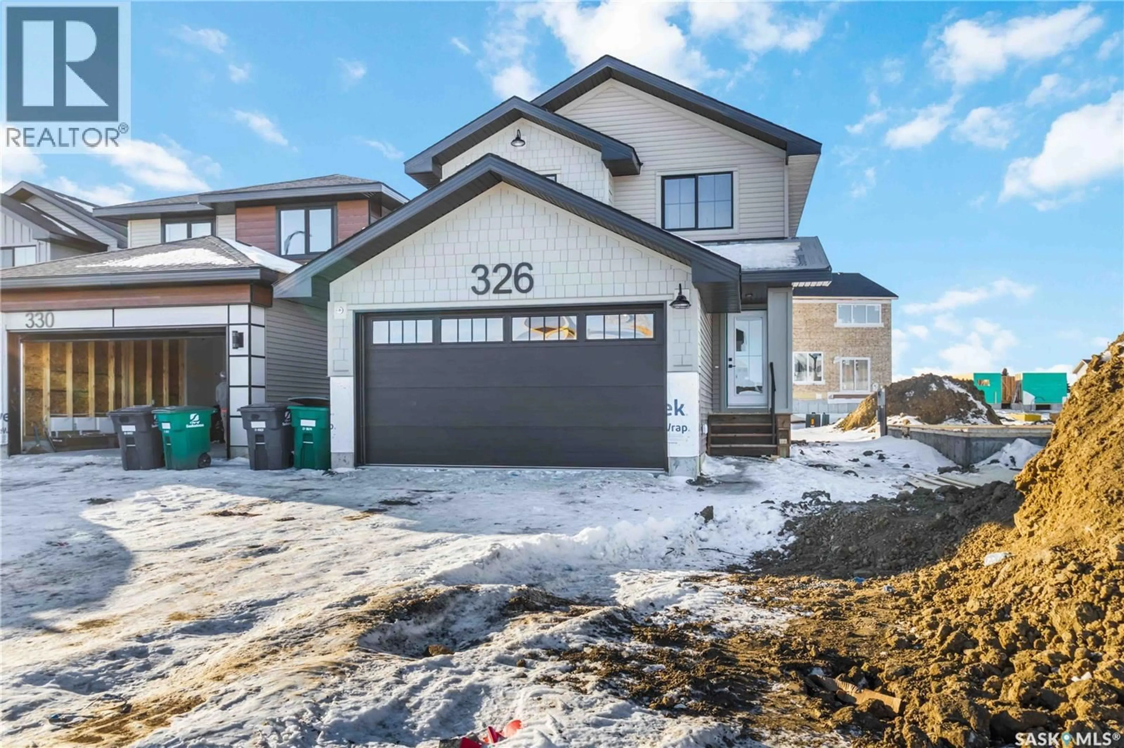 Home with brick exterior material, street for 326 KATZ AVENUE, Saskatoon Saskatchewan S7V1Y6