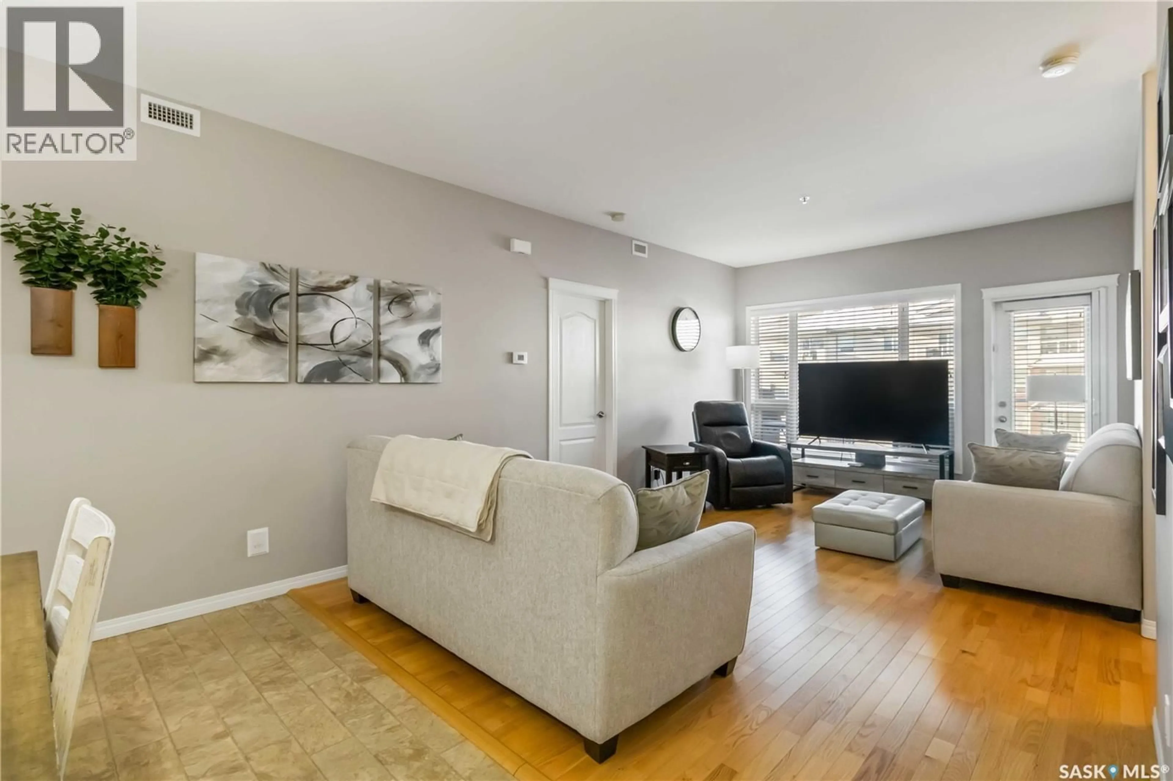 Living room with furniture, unknown for 305 110 ARMISTICE WAY, Saskatoon Saskatchewan S7J5L8