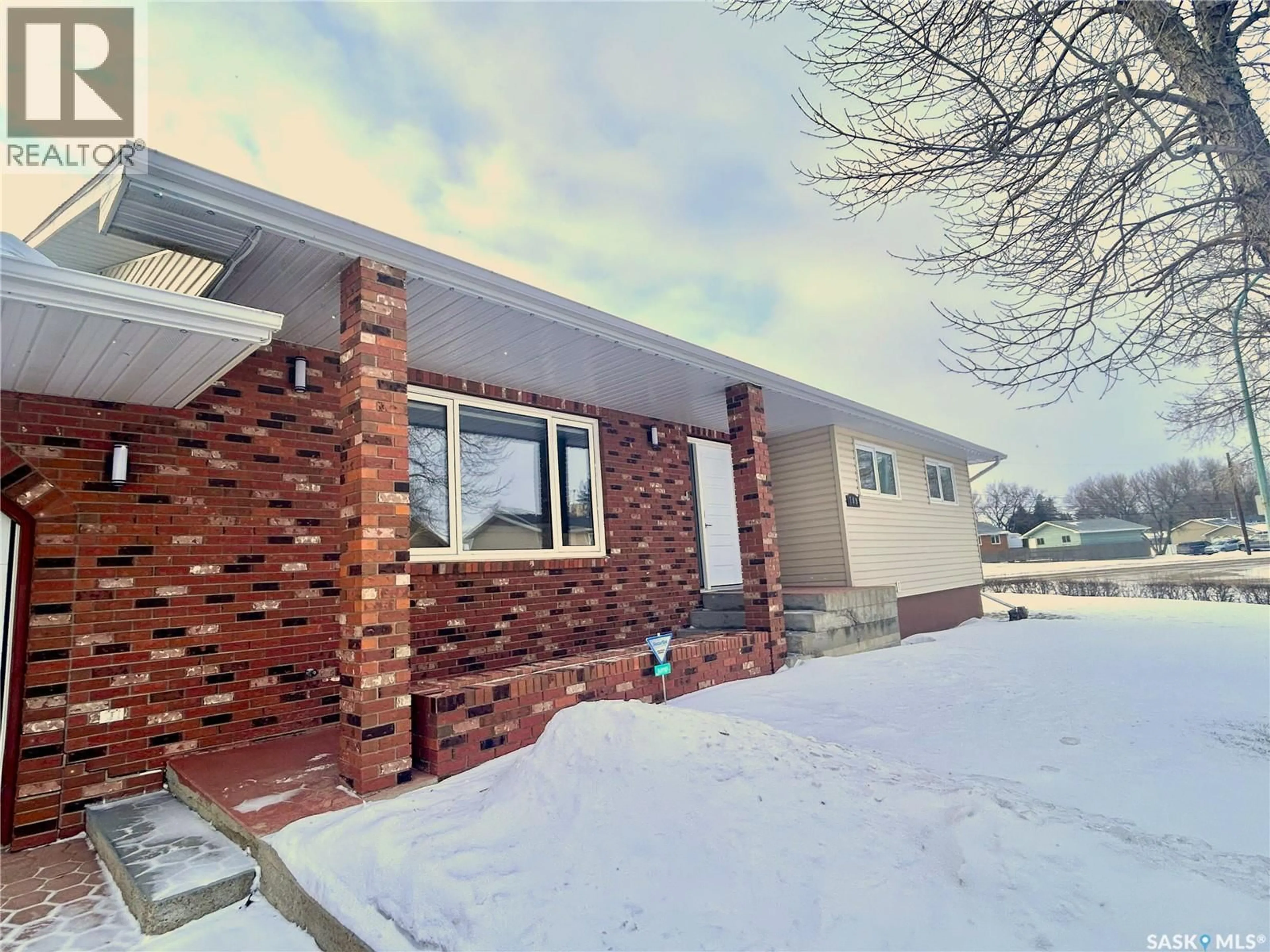 Home with brick exterior material, street for 709 JUBILEE PLACE, Estevan Saskatchewan S4A0A1