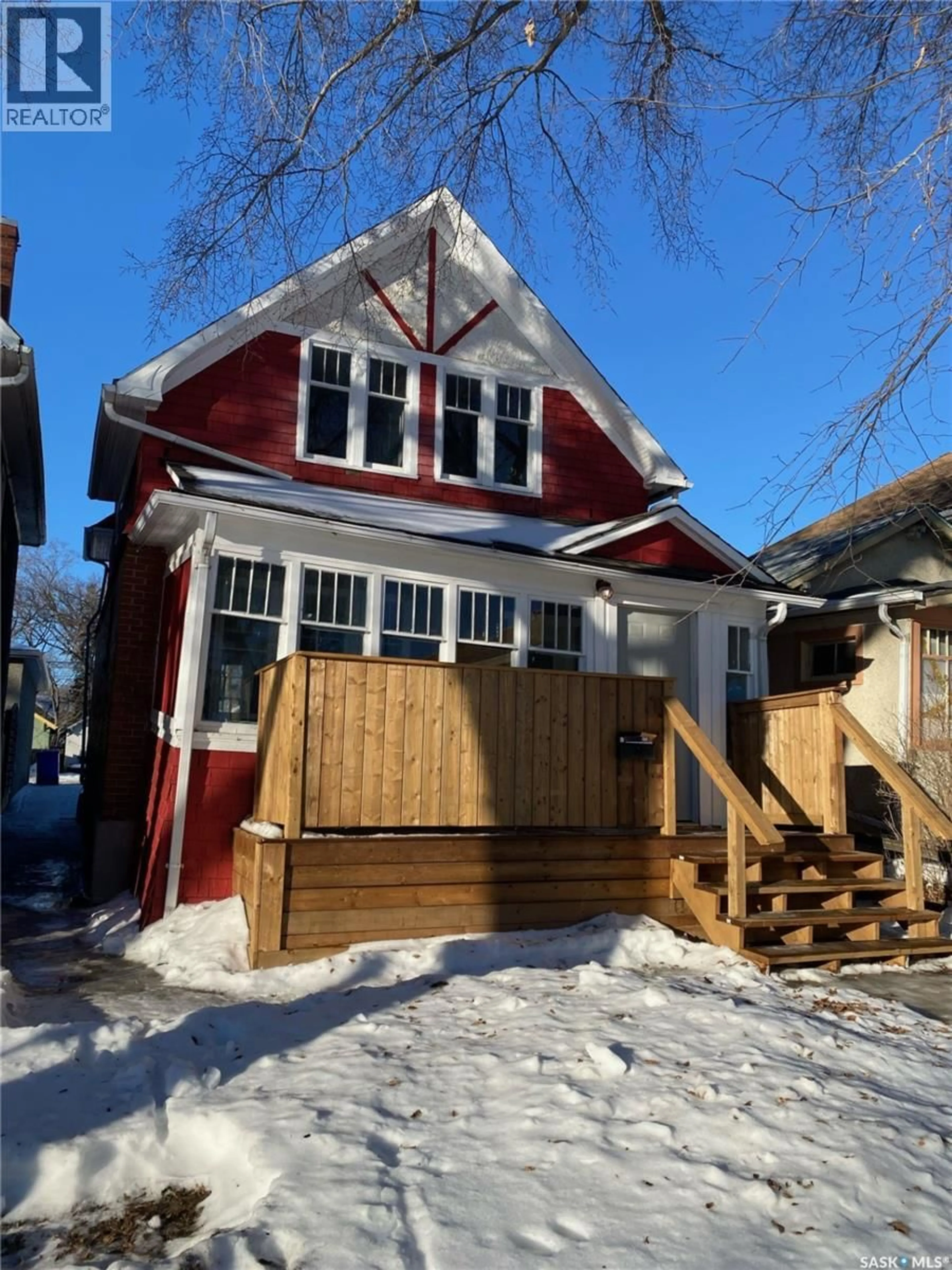 Home with vinyl exterior material, street for 2050 TORONTO STREET, Regina Saskatchewan S4P1N1