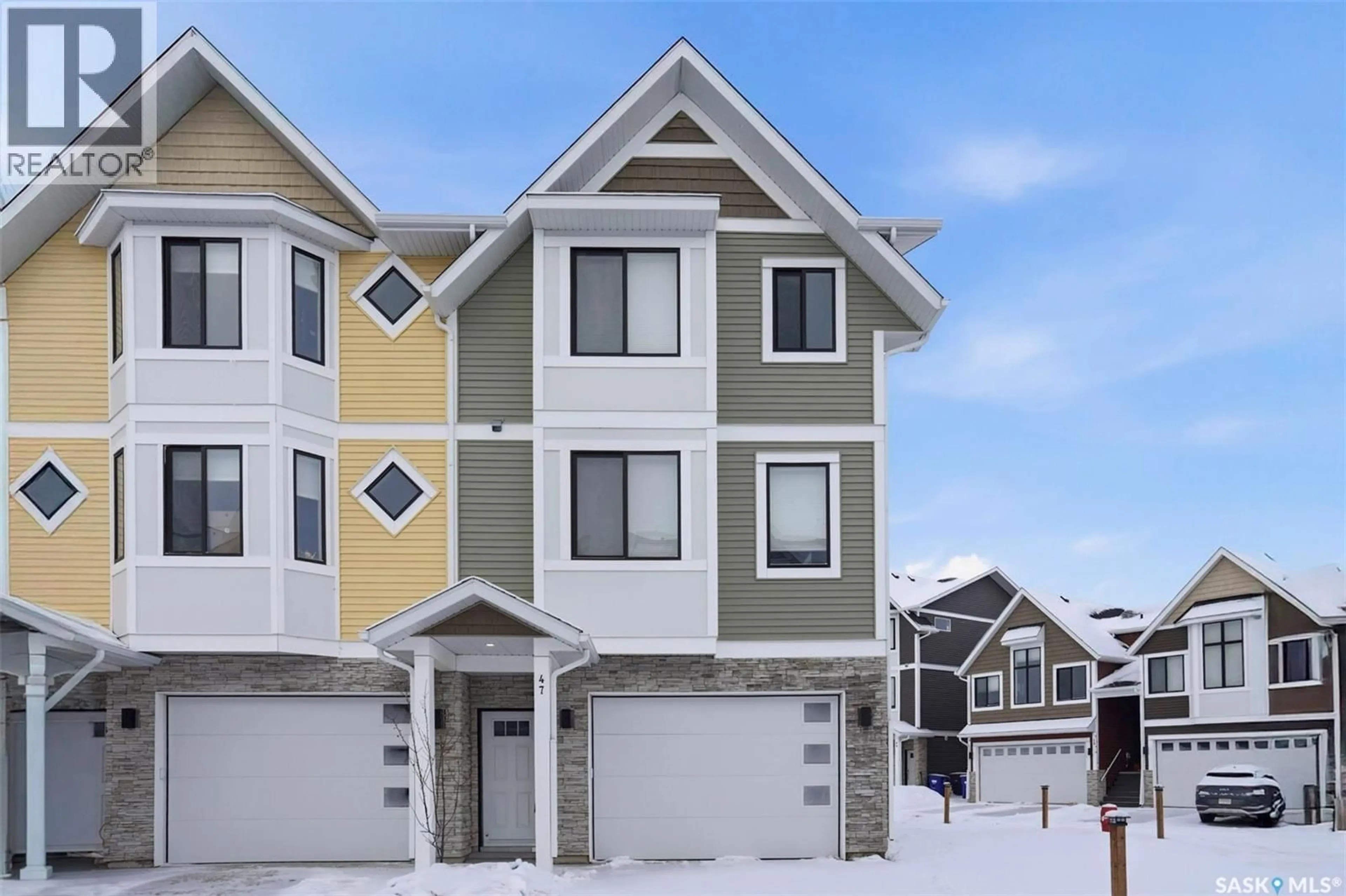 Home with vinyl exterior material, street for 47 ST ANDREWS LANE, Warman Saskatchewan S0K4S4