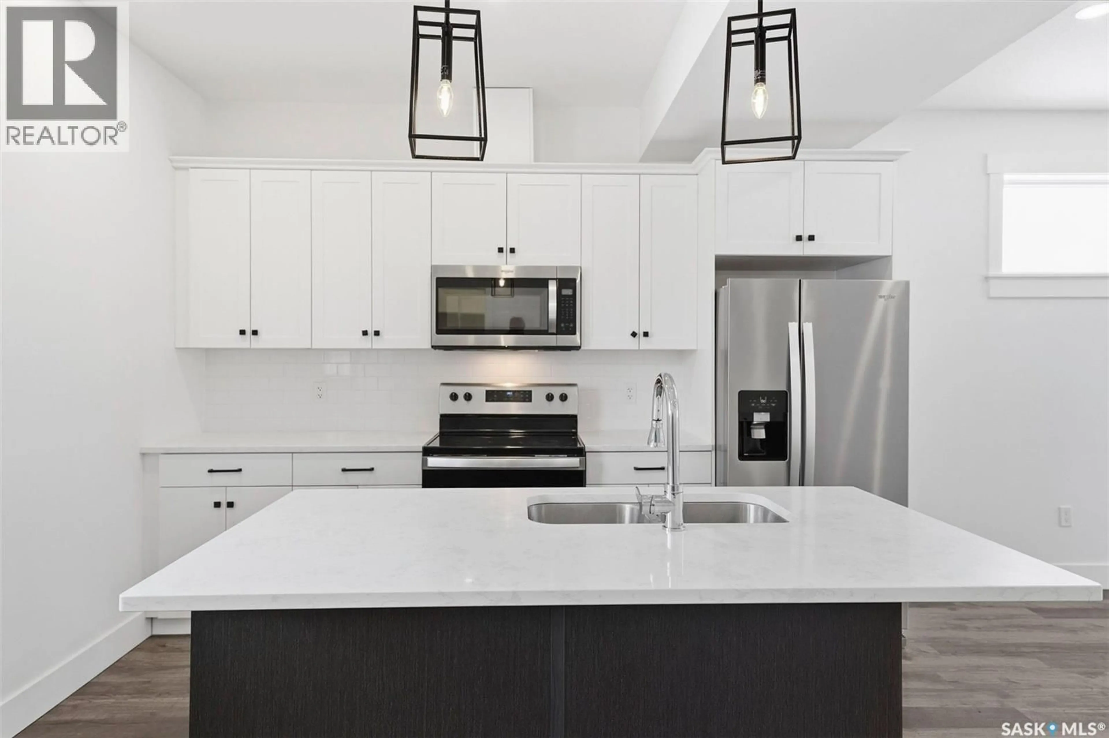 Open concept kitchen, ceramic/tile floor for 47 ST ANDREWS LANE, Warman Saskatchewan S0K4S4